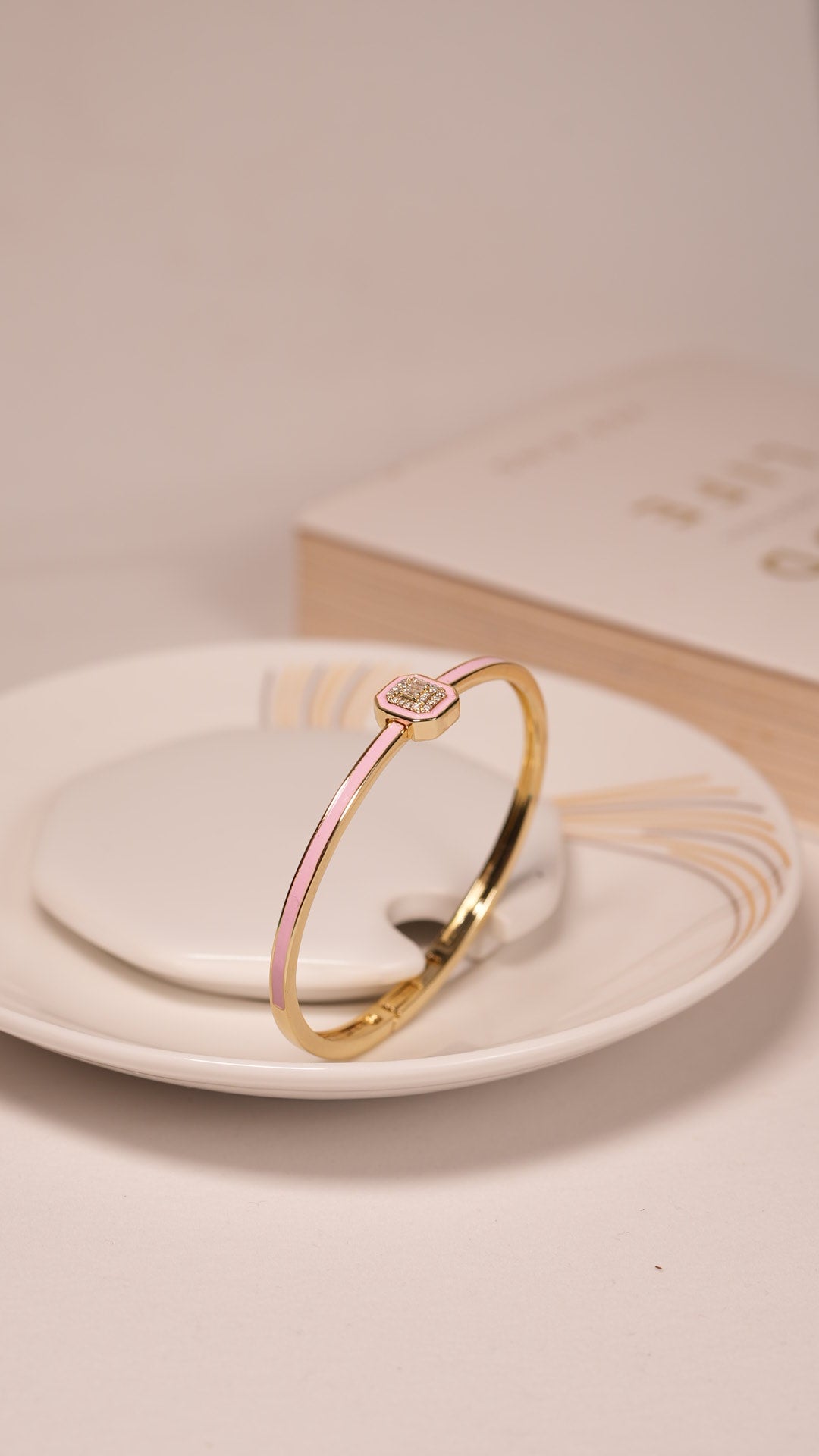 Blush emblem bracelet