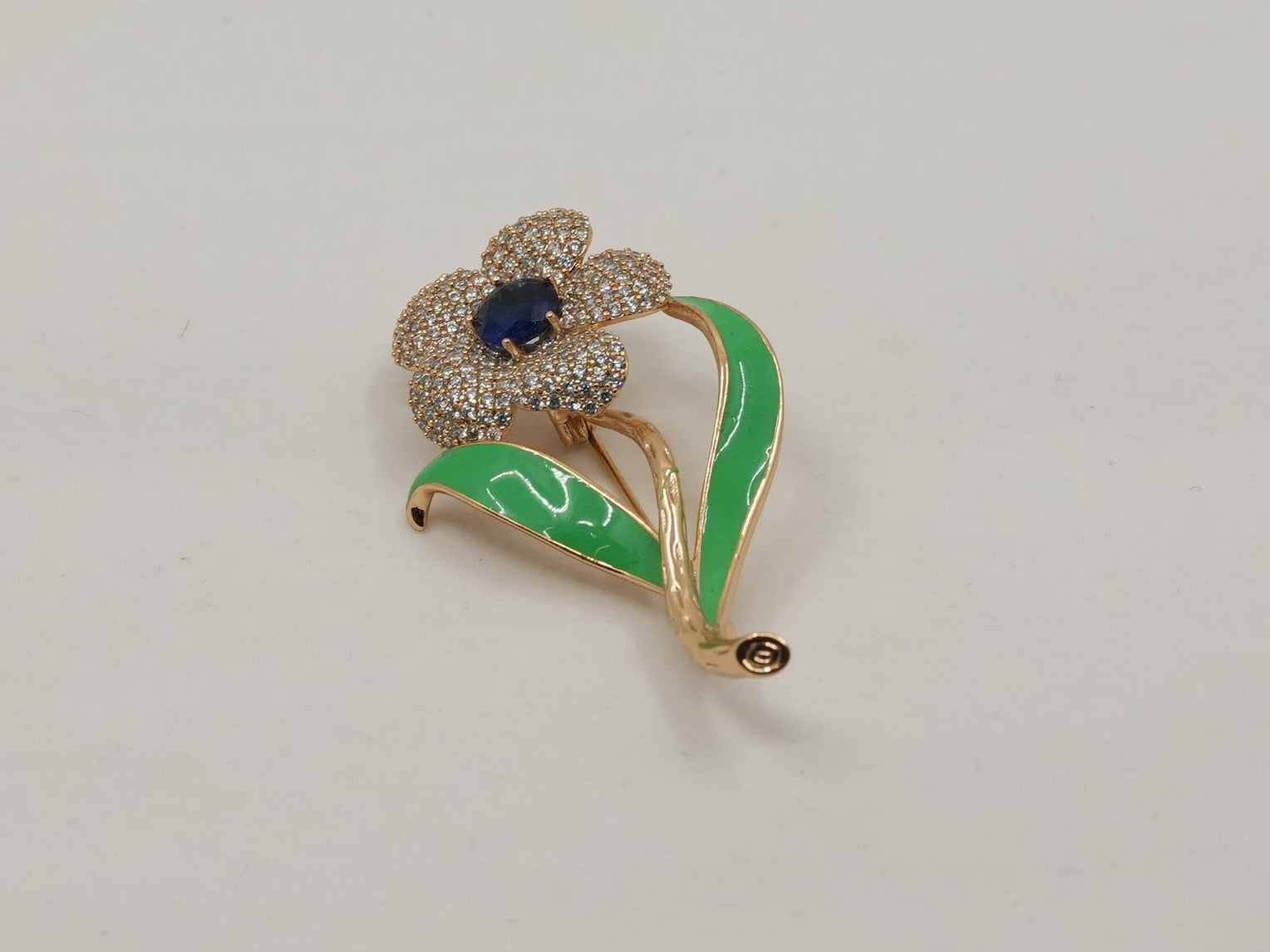 Green enamel floral brooch