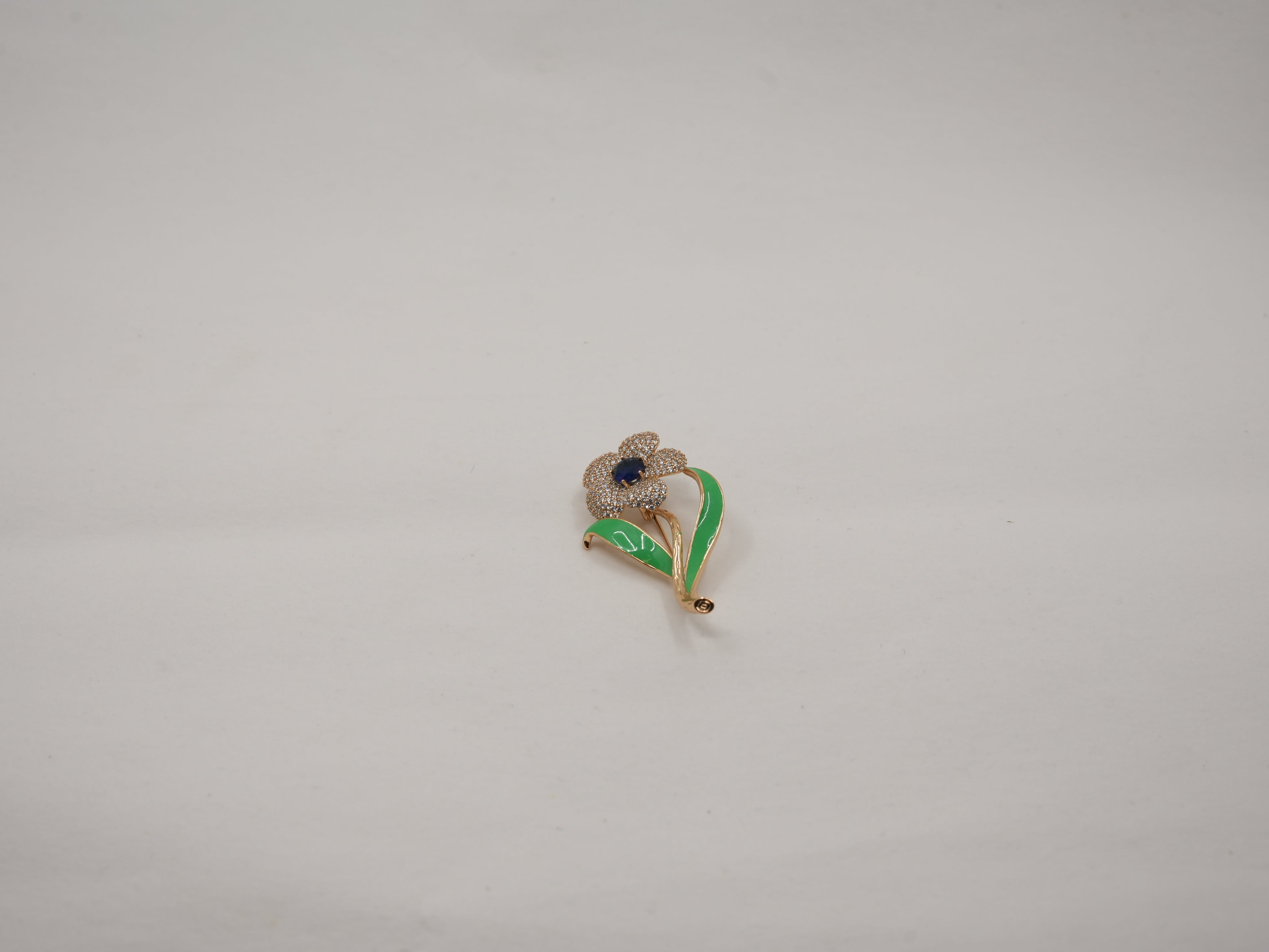 Green enamel floral brooch