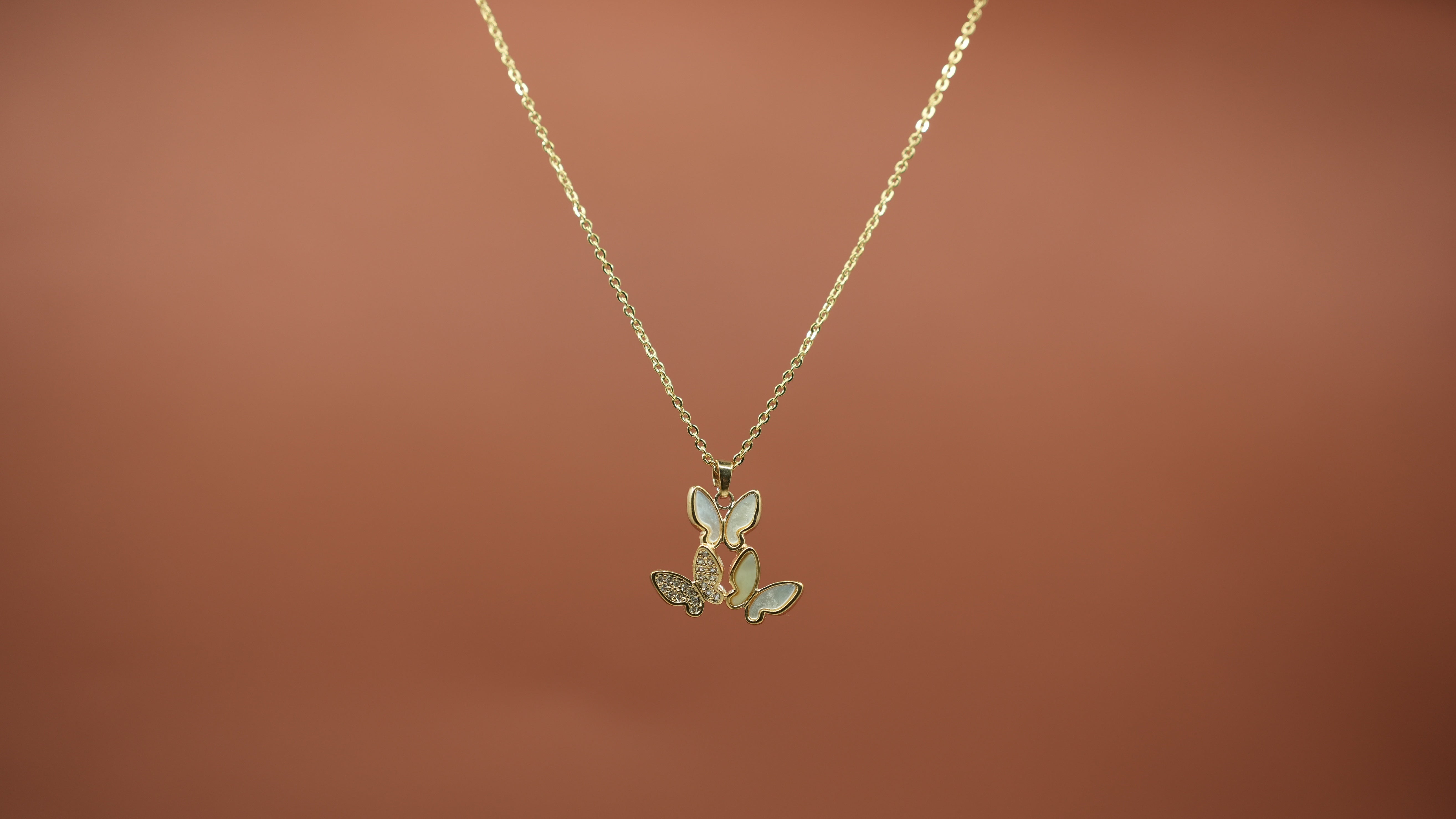 Tri flutter Gold necklace