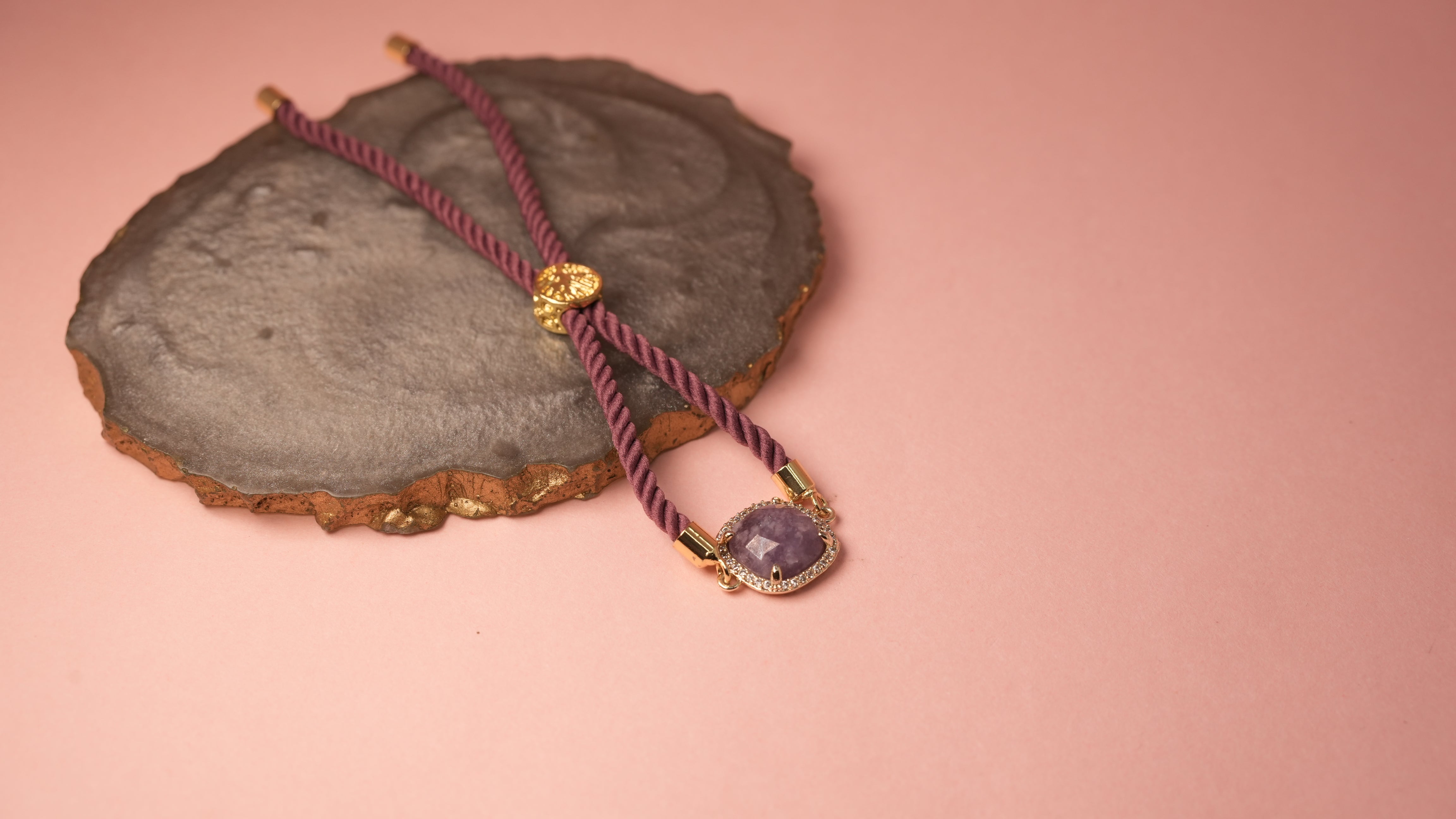 Square purple chord bracelets