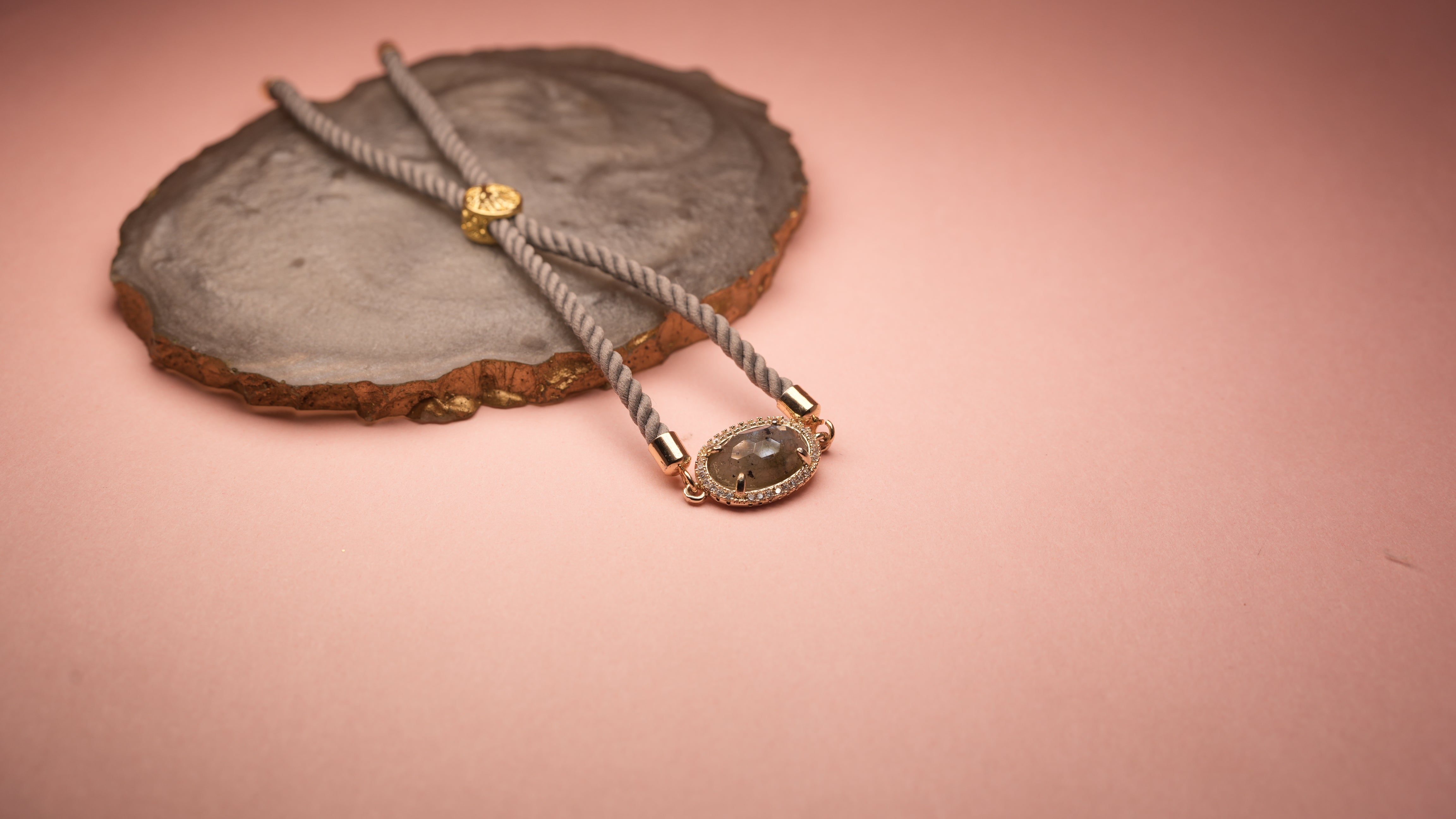 Oval grey chord bracelet