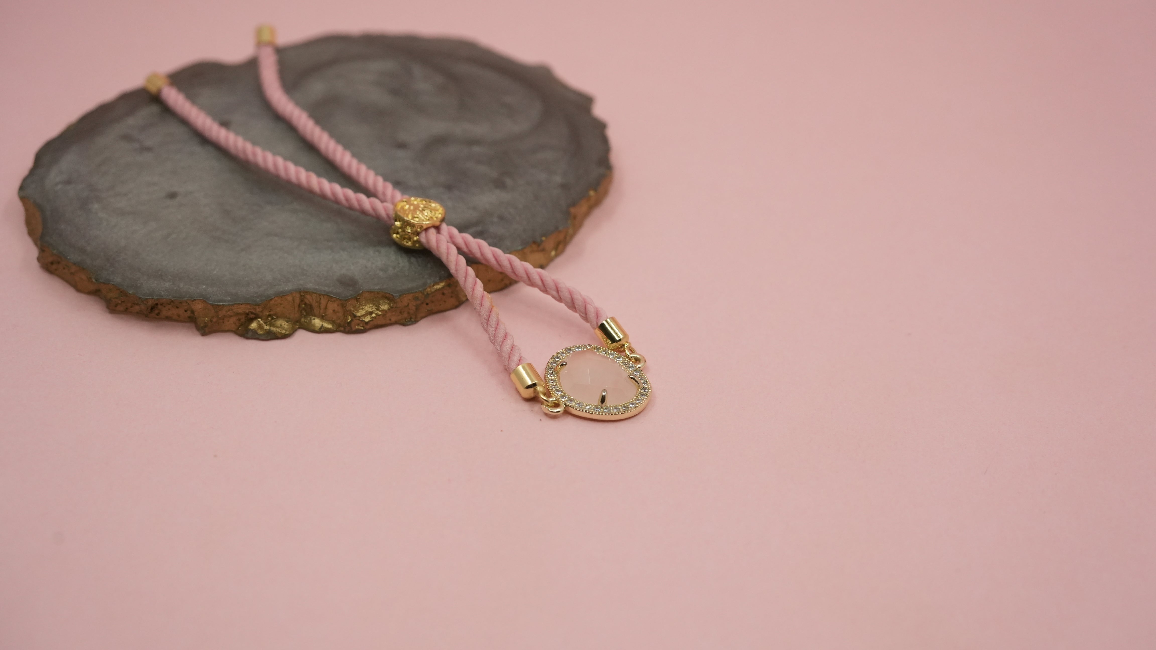 Opaque pink chord bracelet