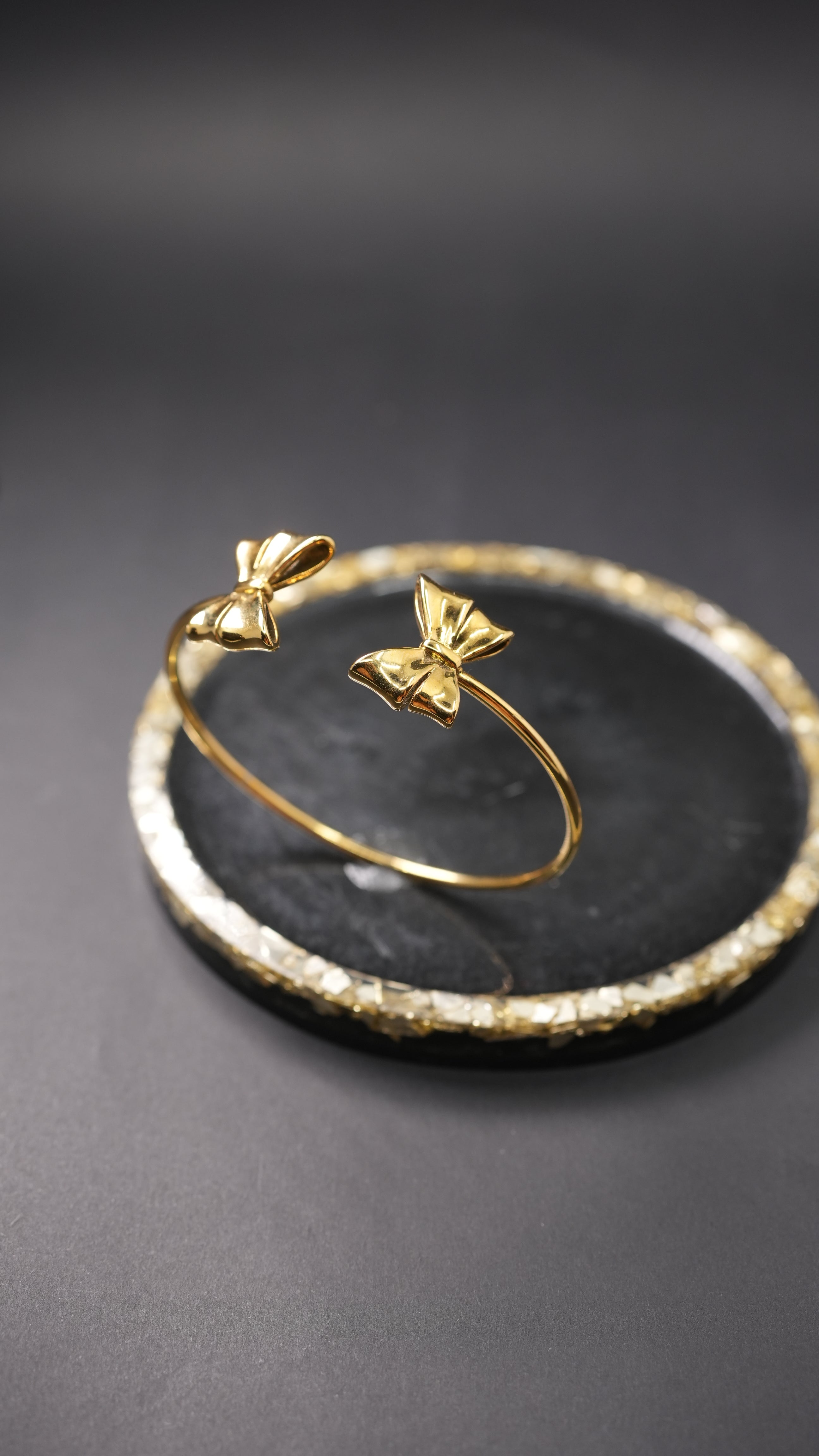 Bow and twirl cuff