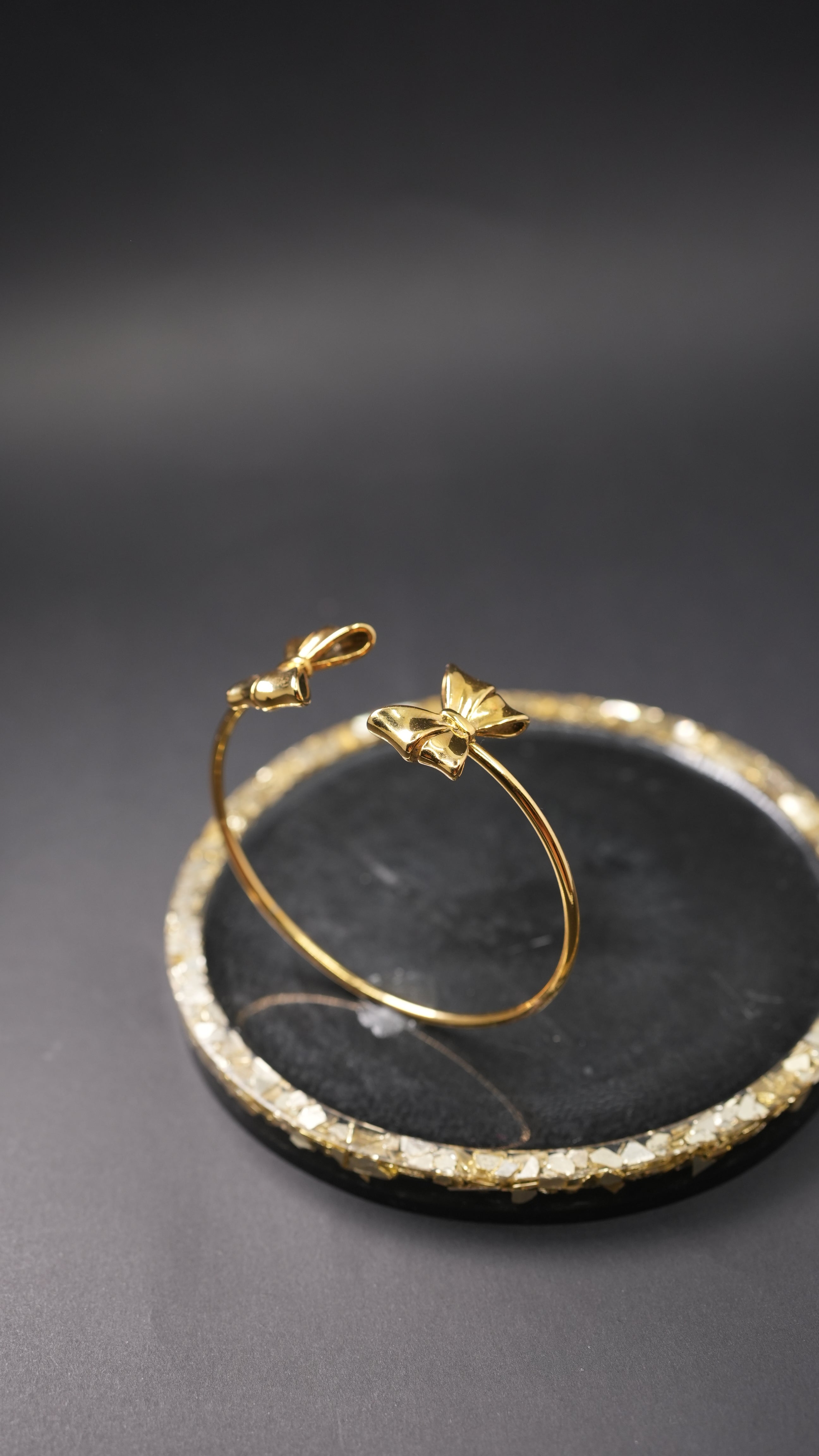 Bow and twirl cuff