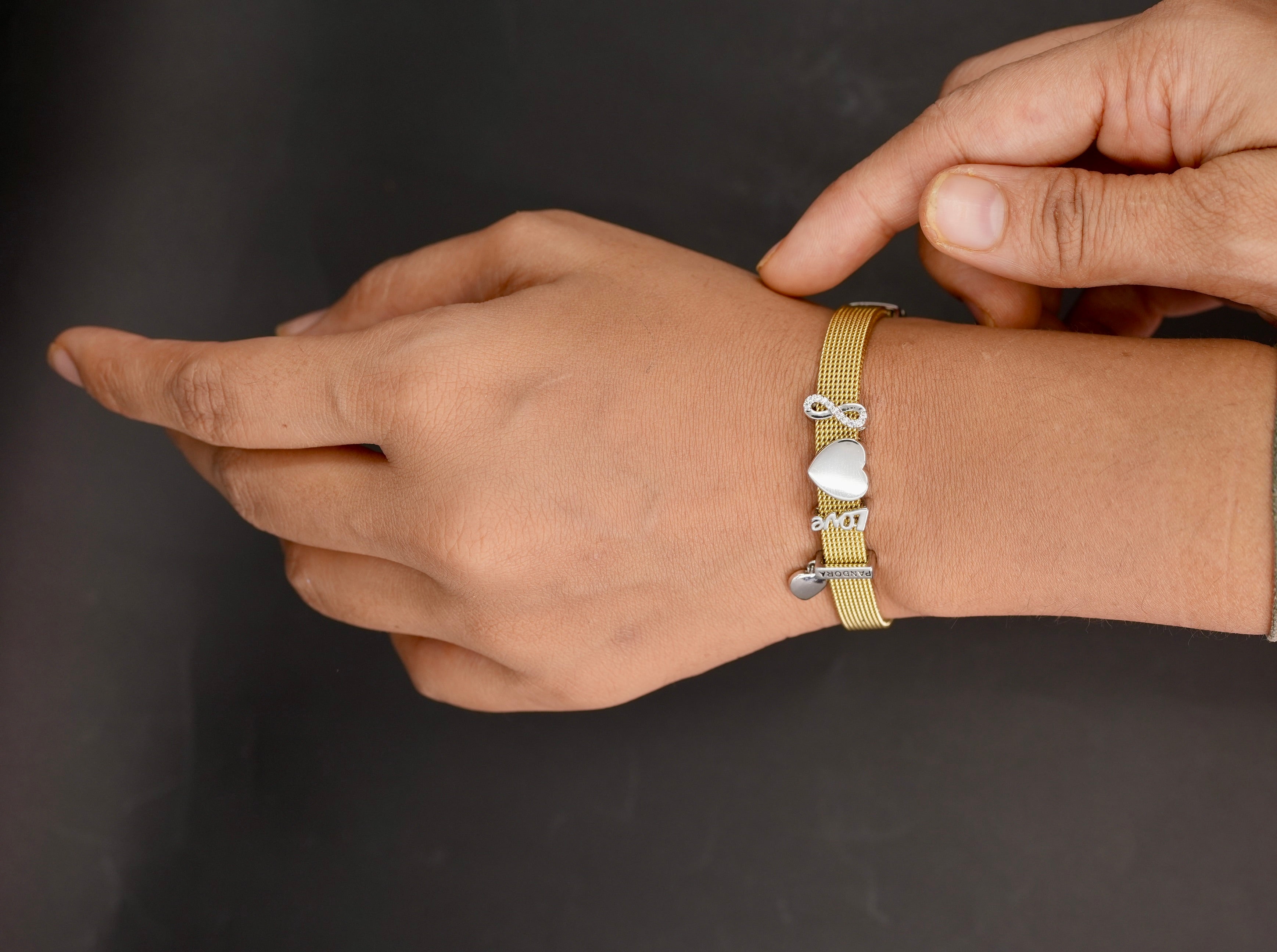 Gold belt charm