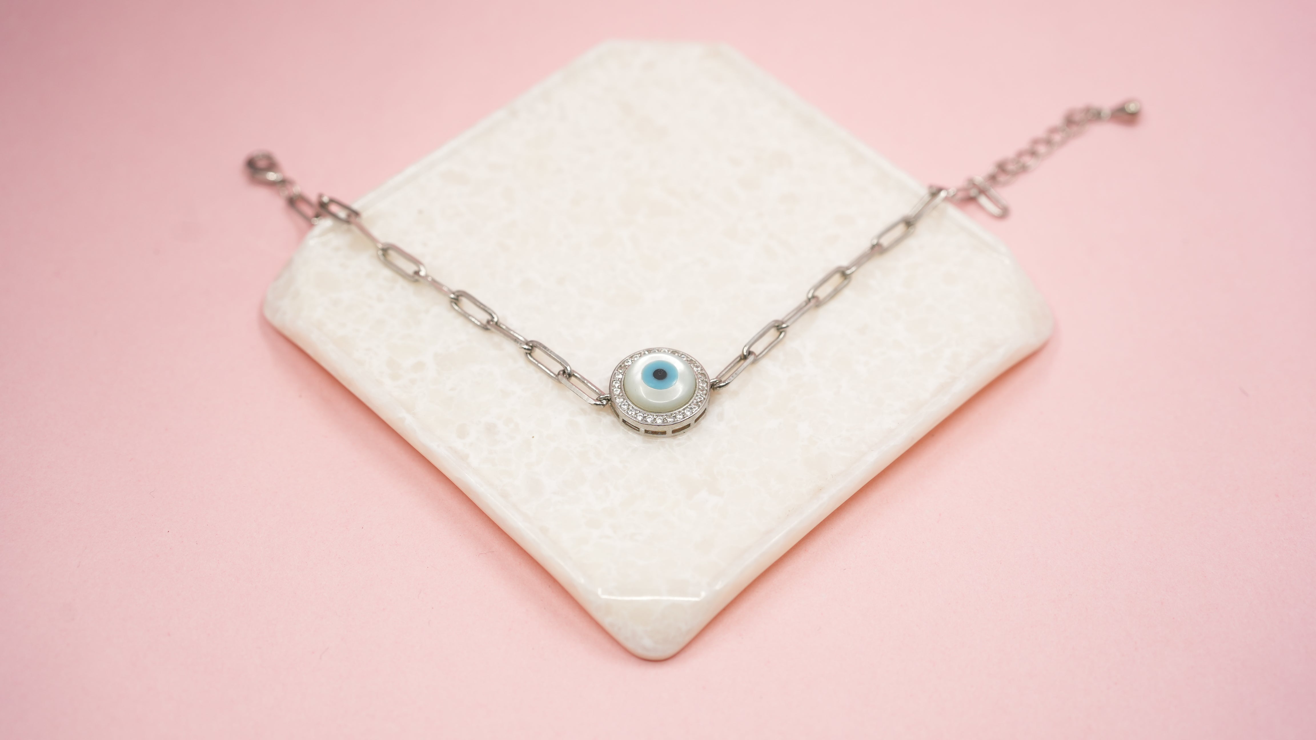 Linked evil eye