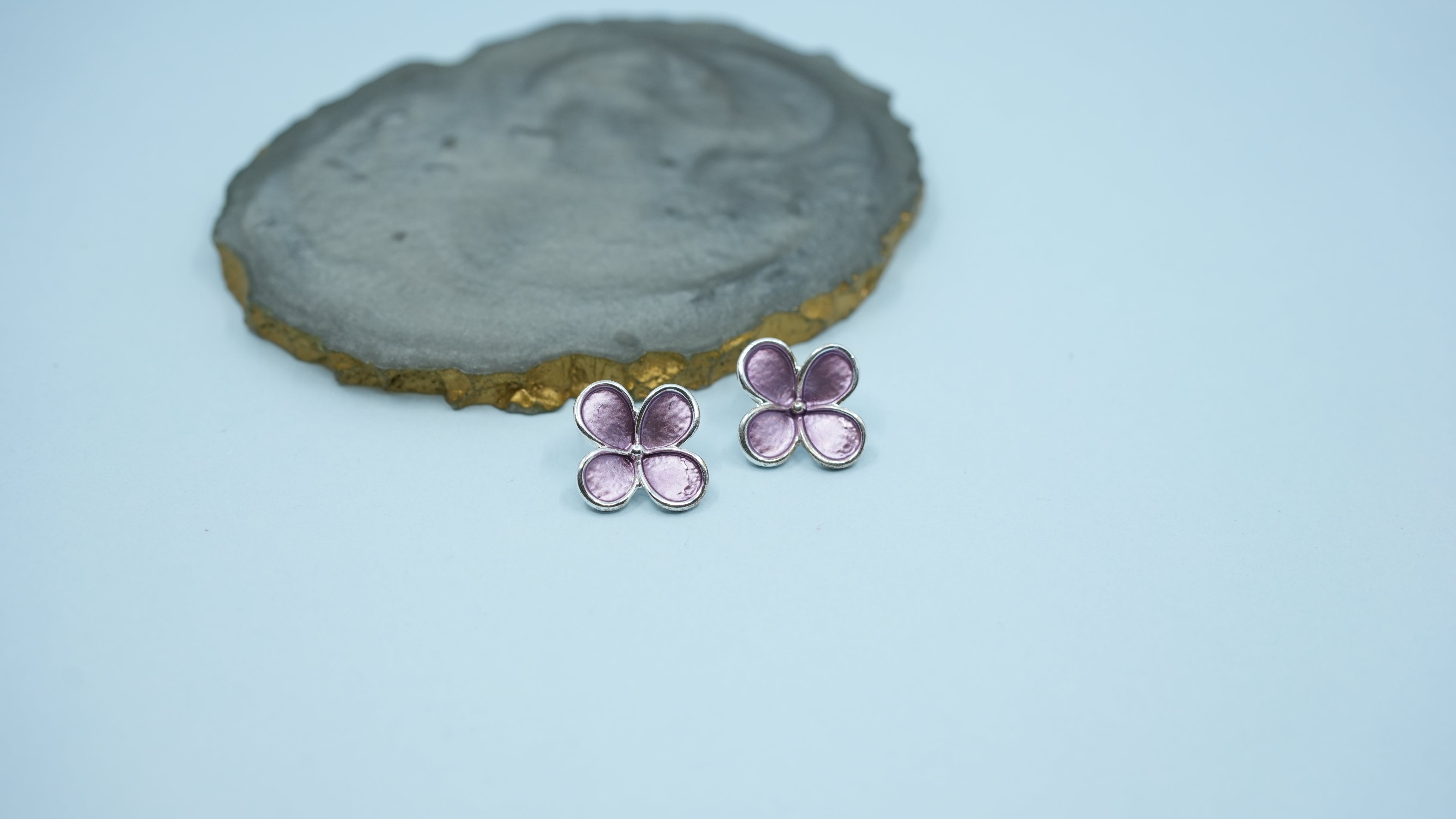 Small purple floral stud