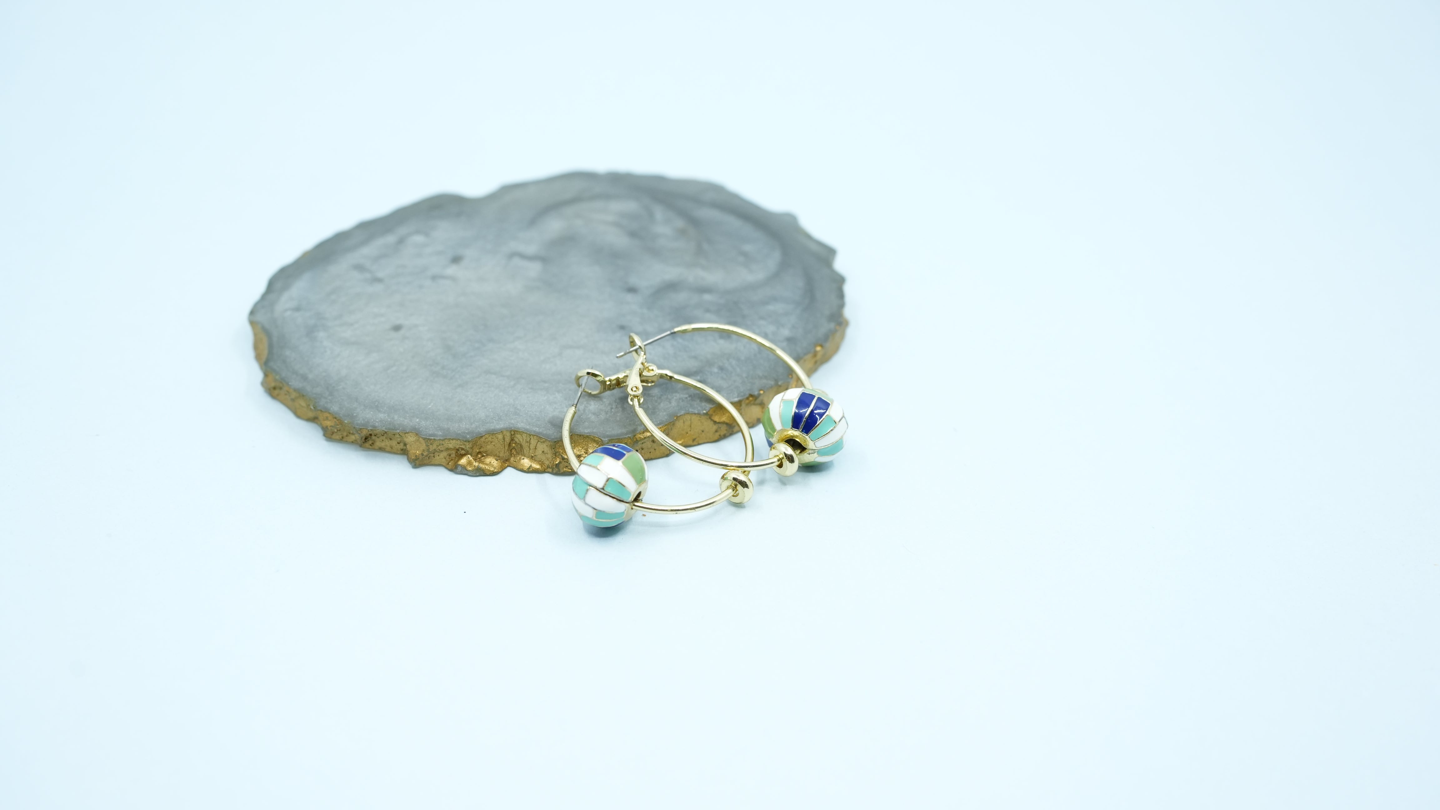 Green whirl earring