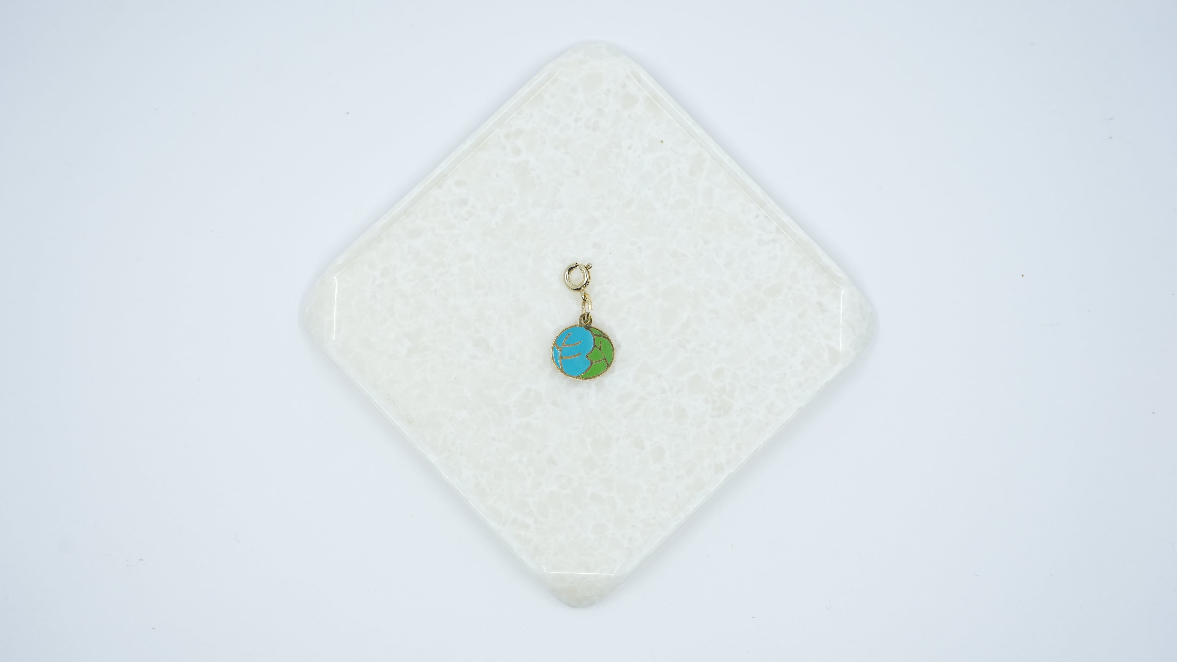 Earth heart charm