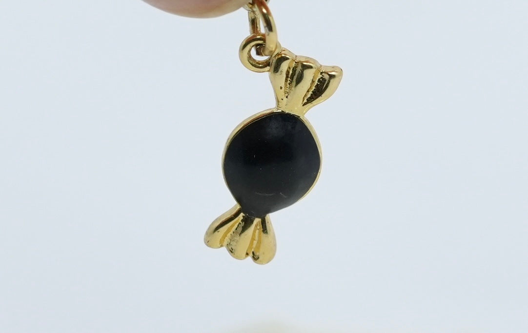 Black Whirl Charm