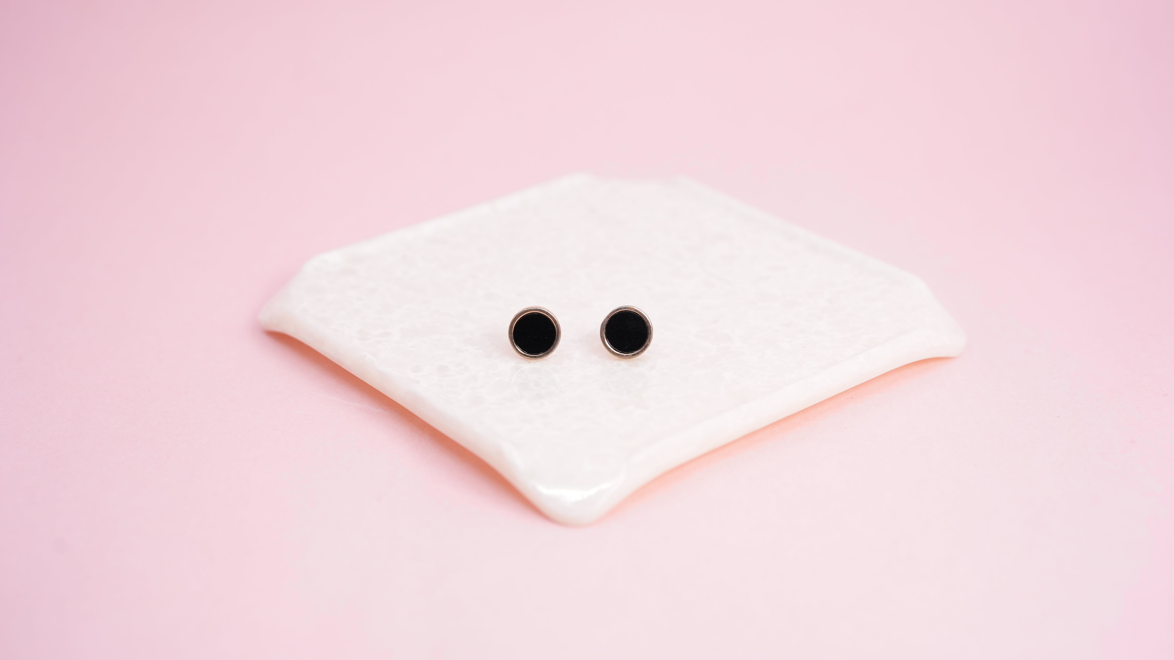 Black dot stud