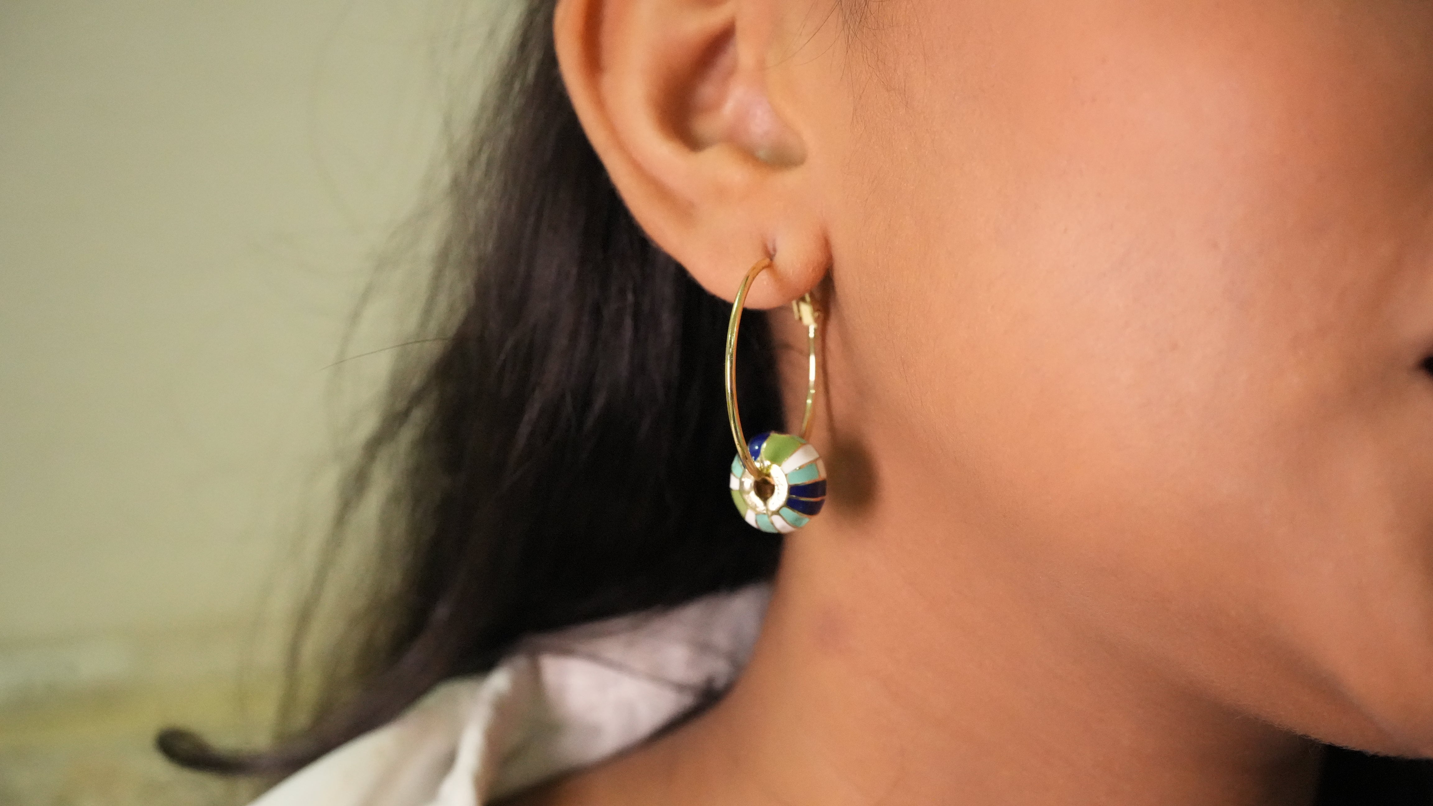 Green whirl earring