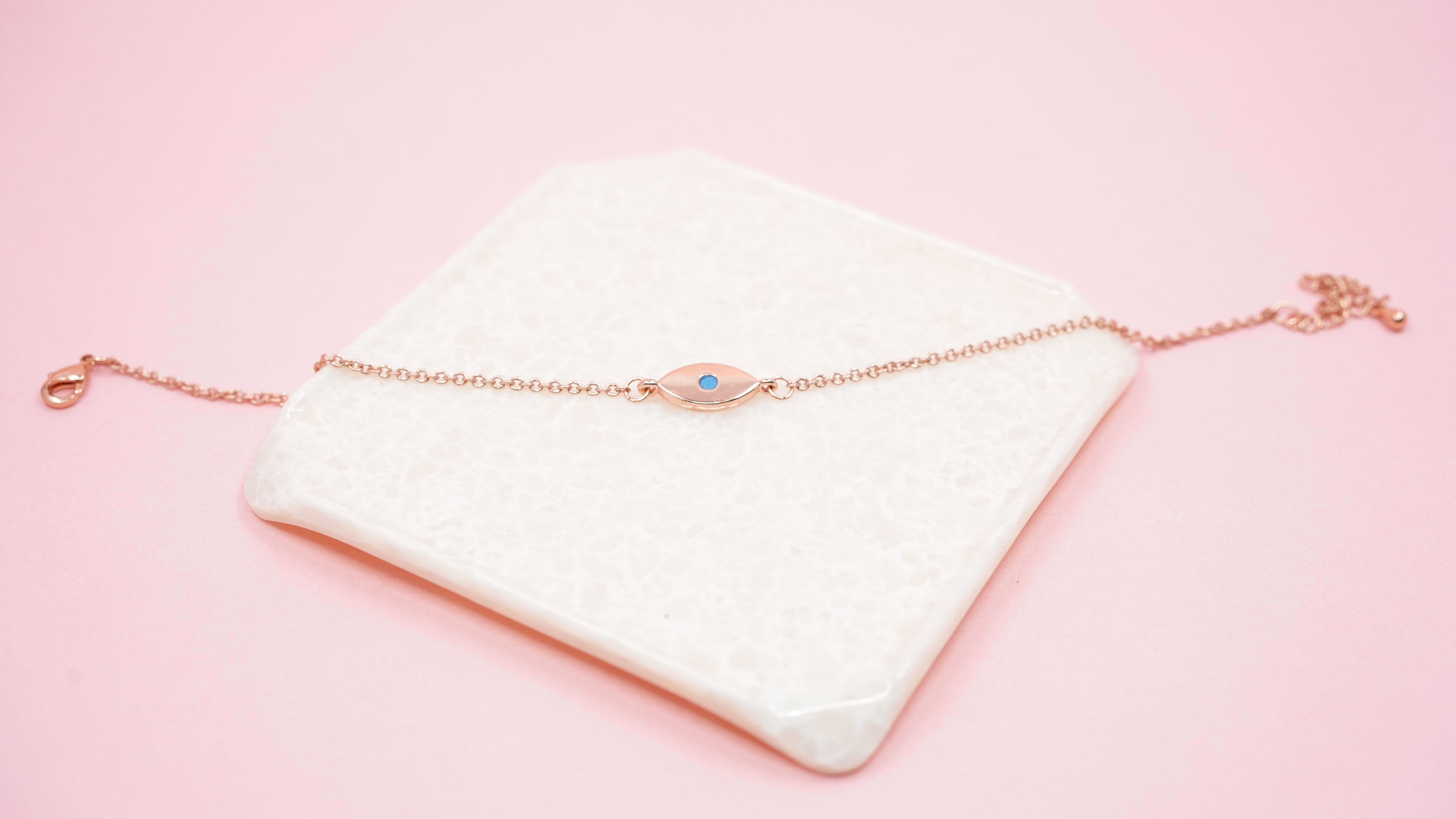 Rose gold evil eye