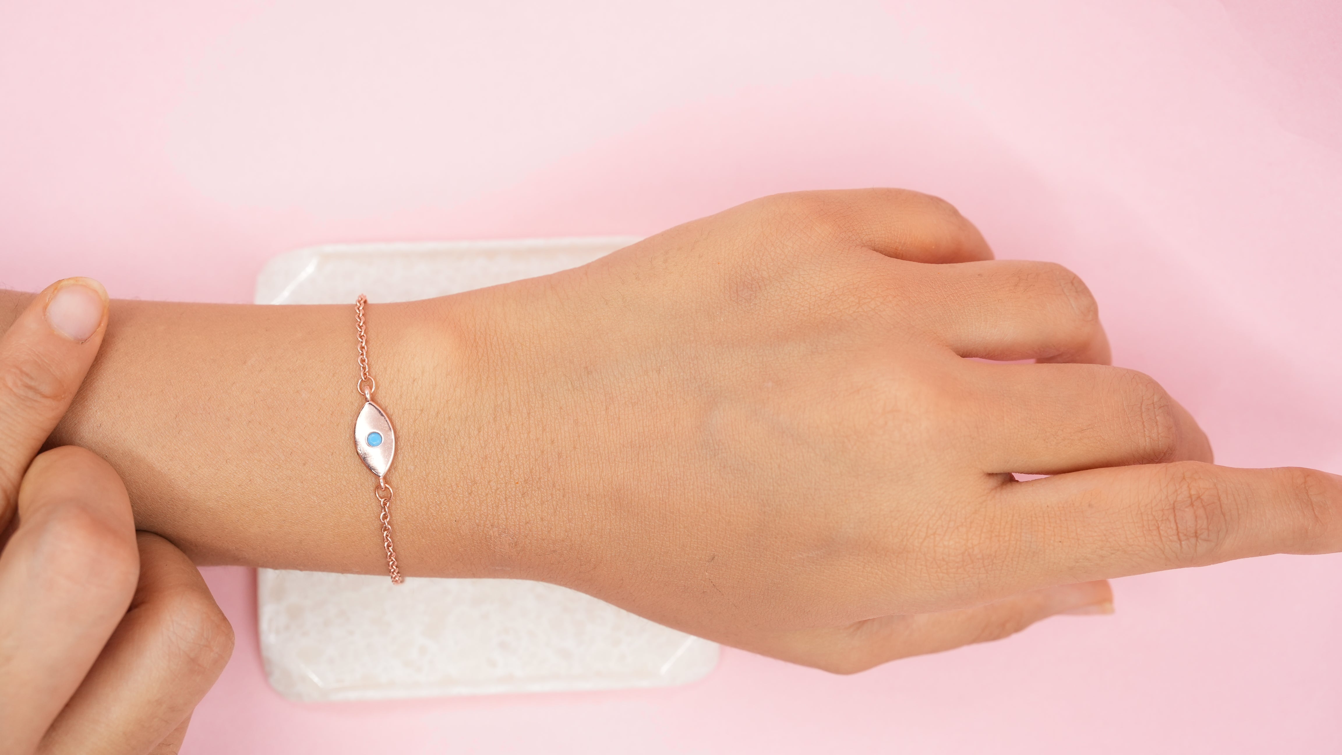 Rose gold evil eye