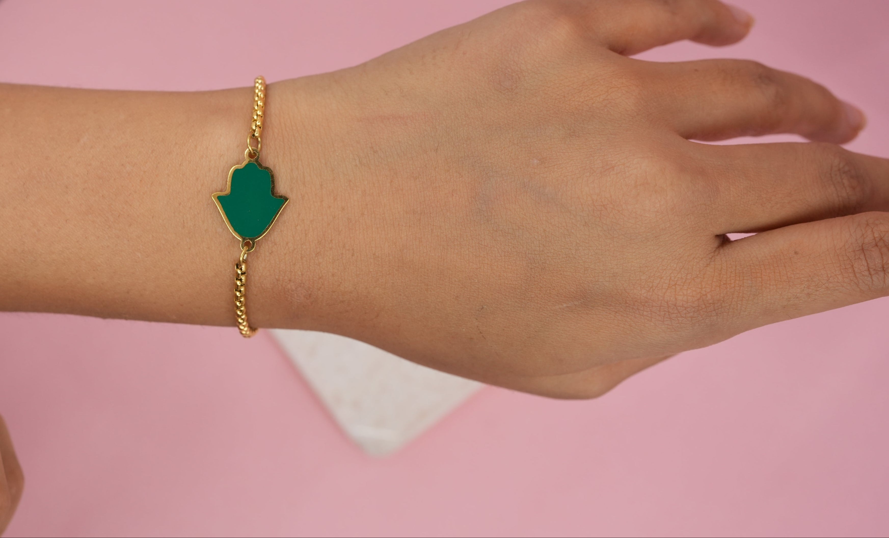 Green hamsa
