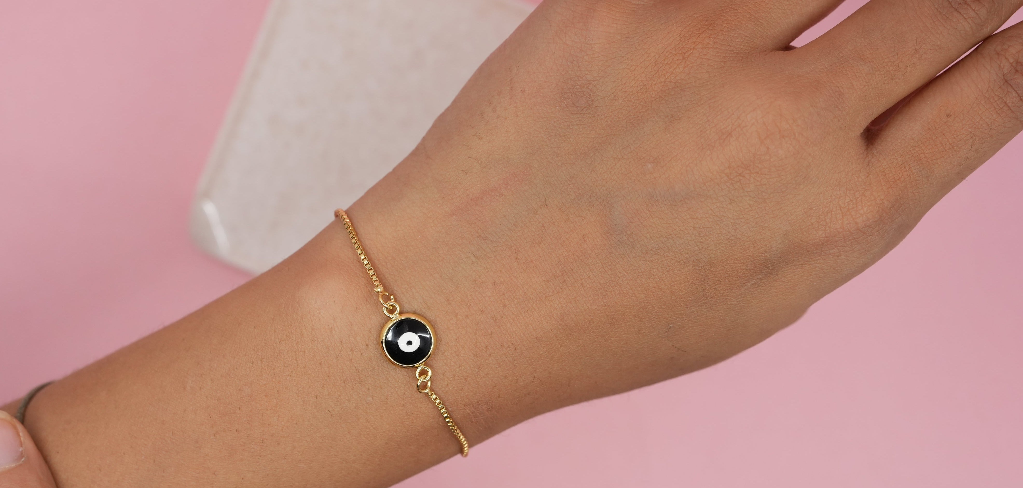 Black eye amulet golden