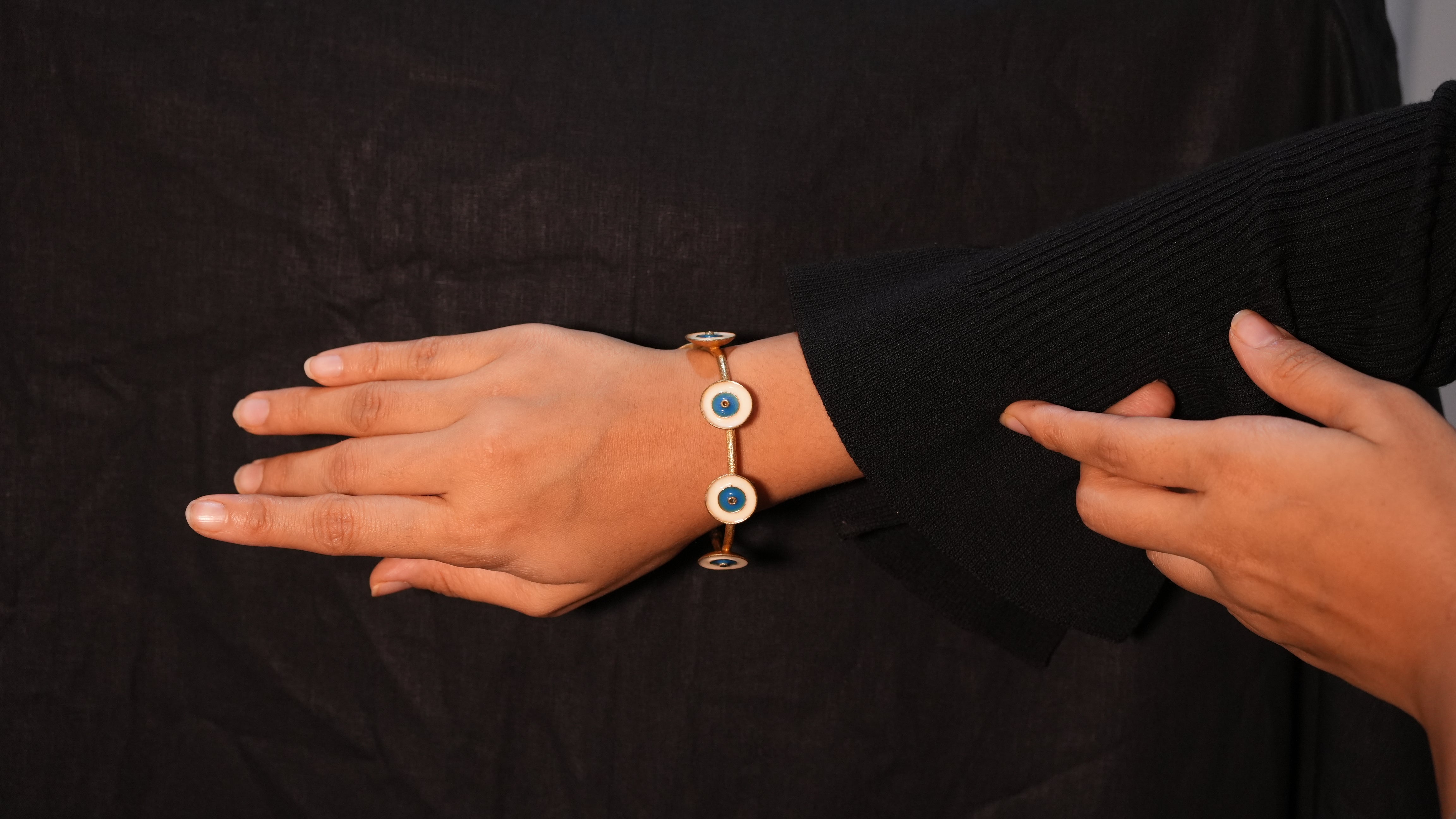 Gold evil eye