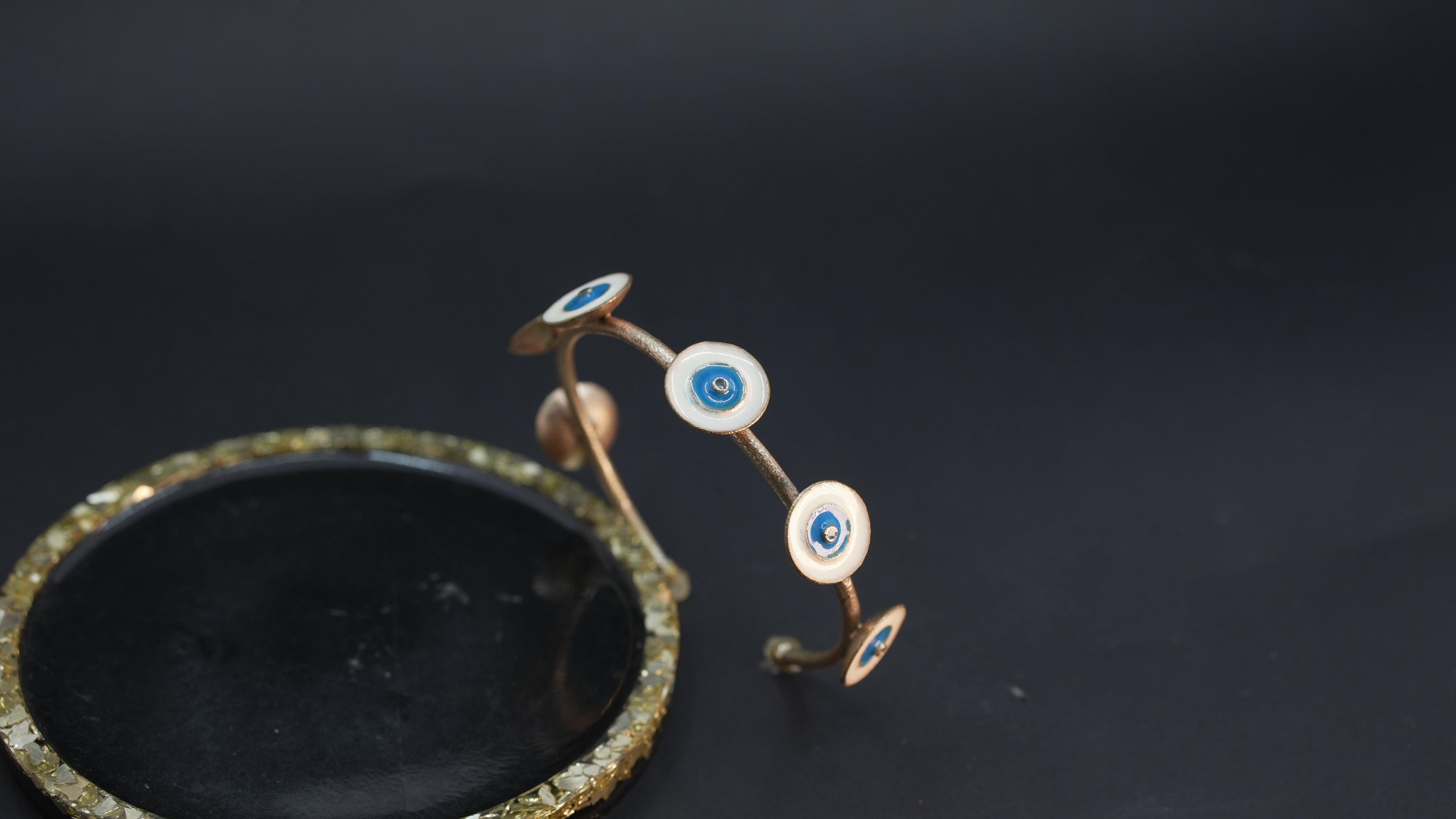 Rose gold evil eye