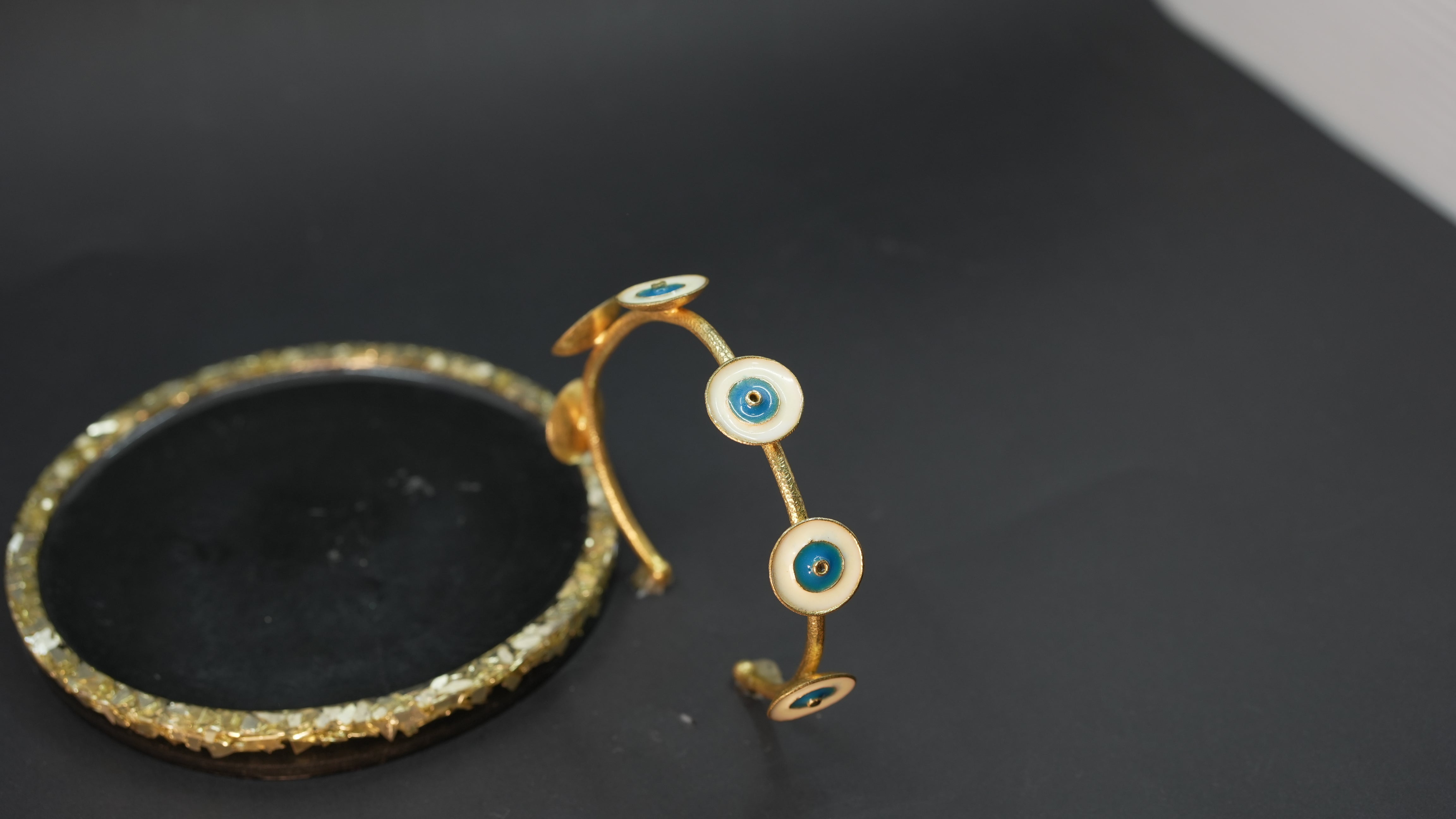 Gold evil eye