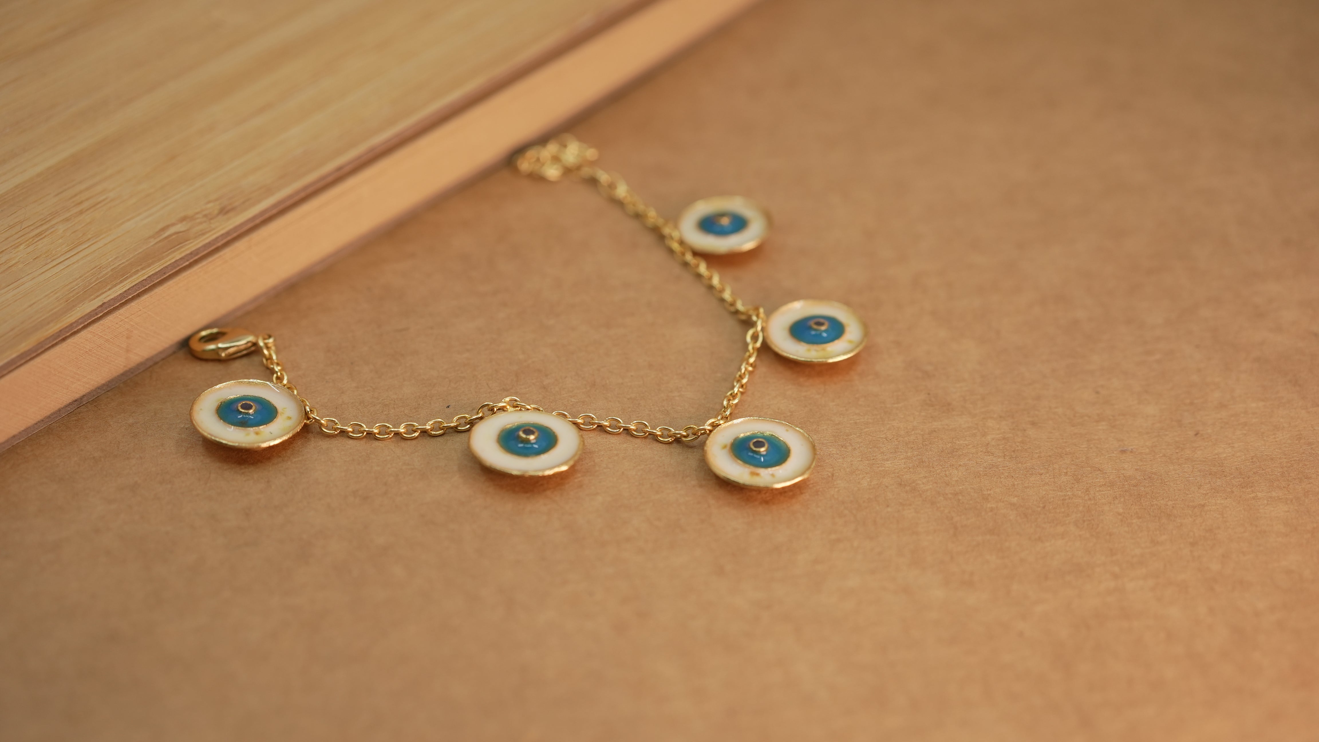 Charm evil eye gold bracelet