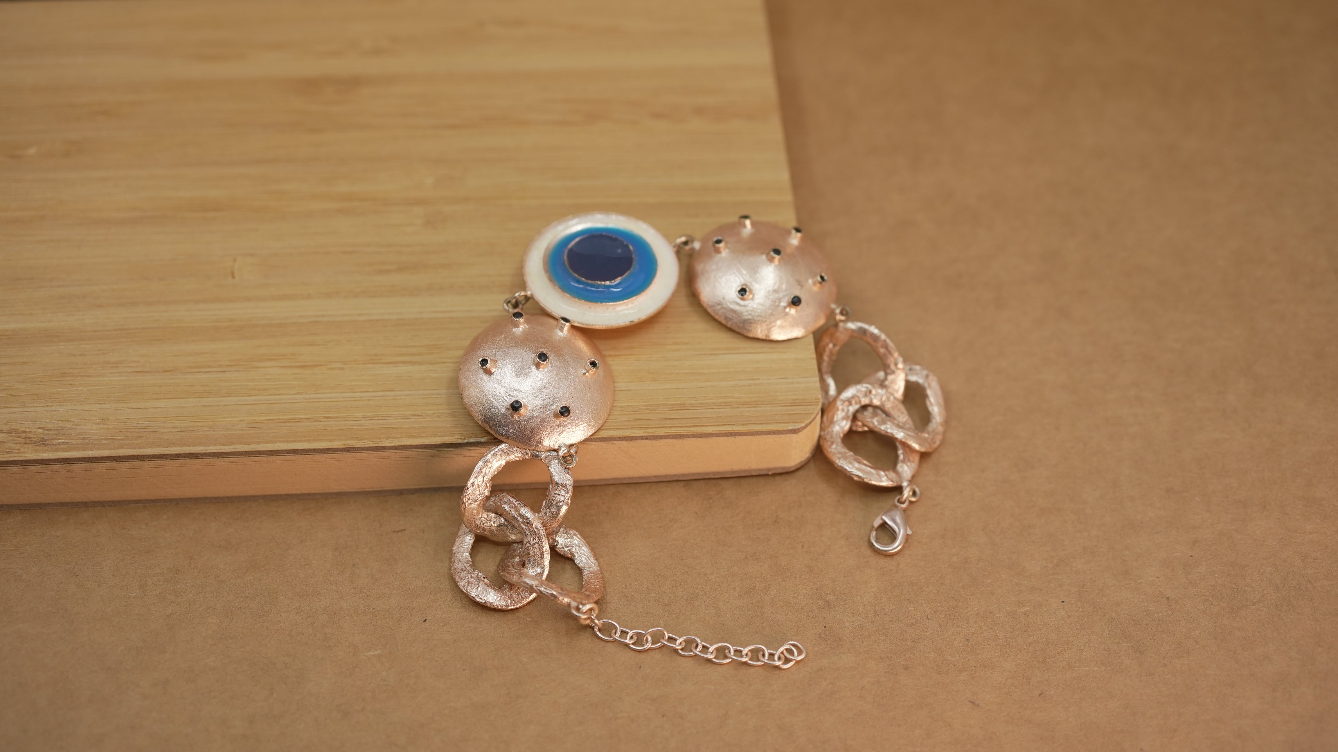 Evil eye linked bracelet rosegold