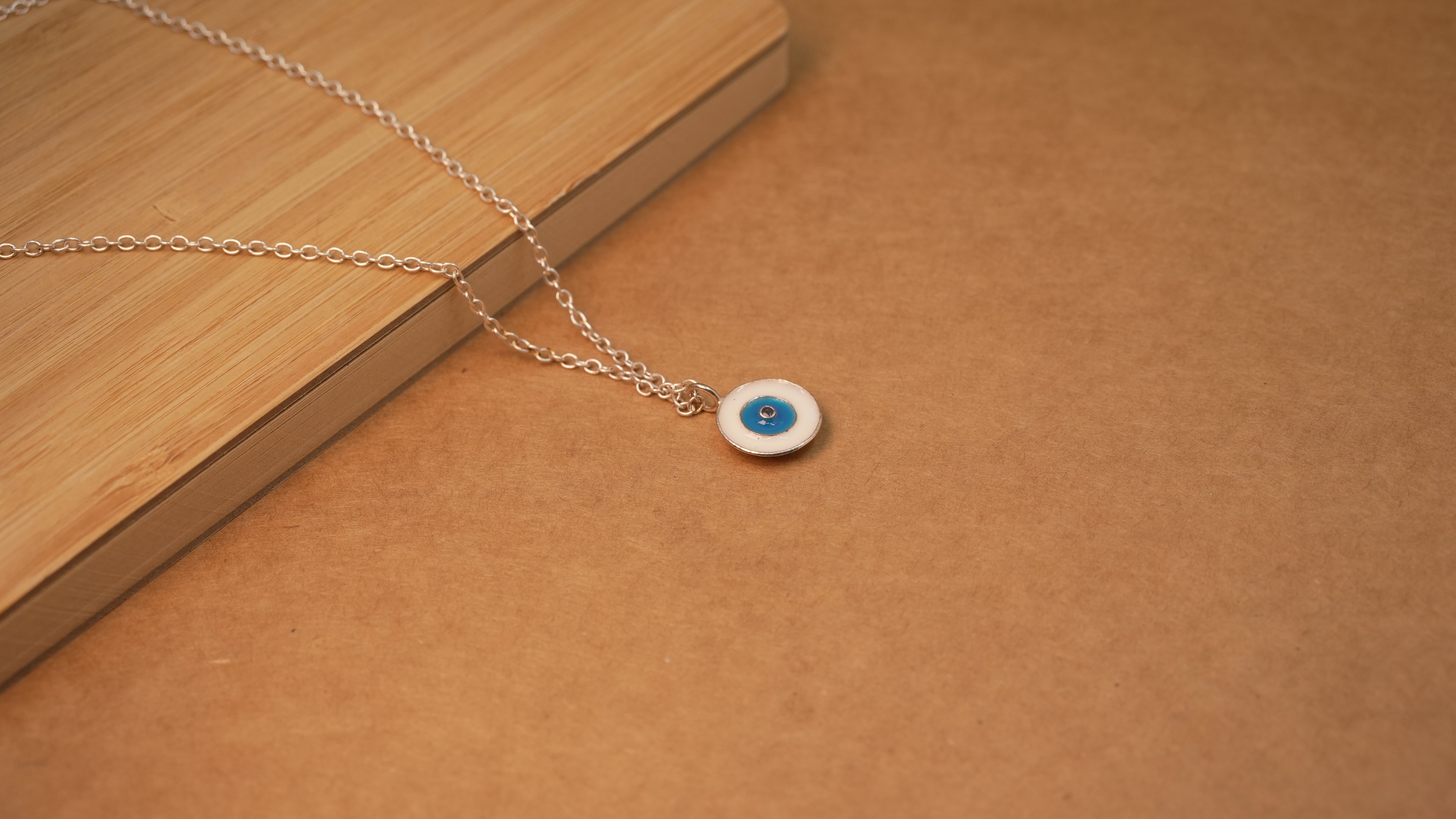 Single evil eye pendant Rose gold