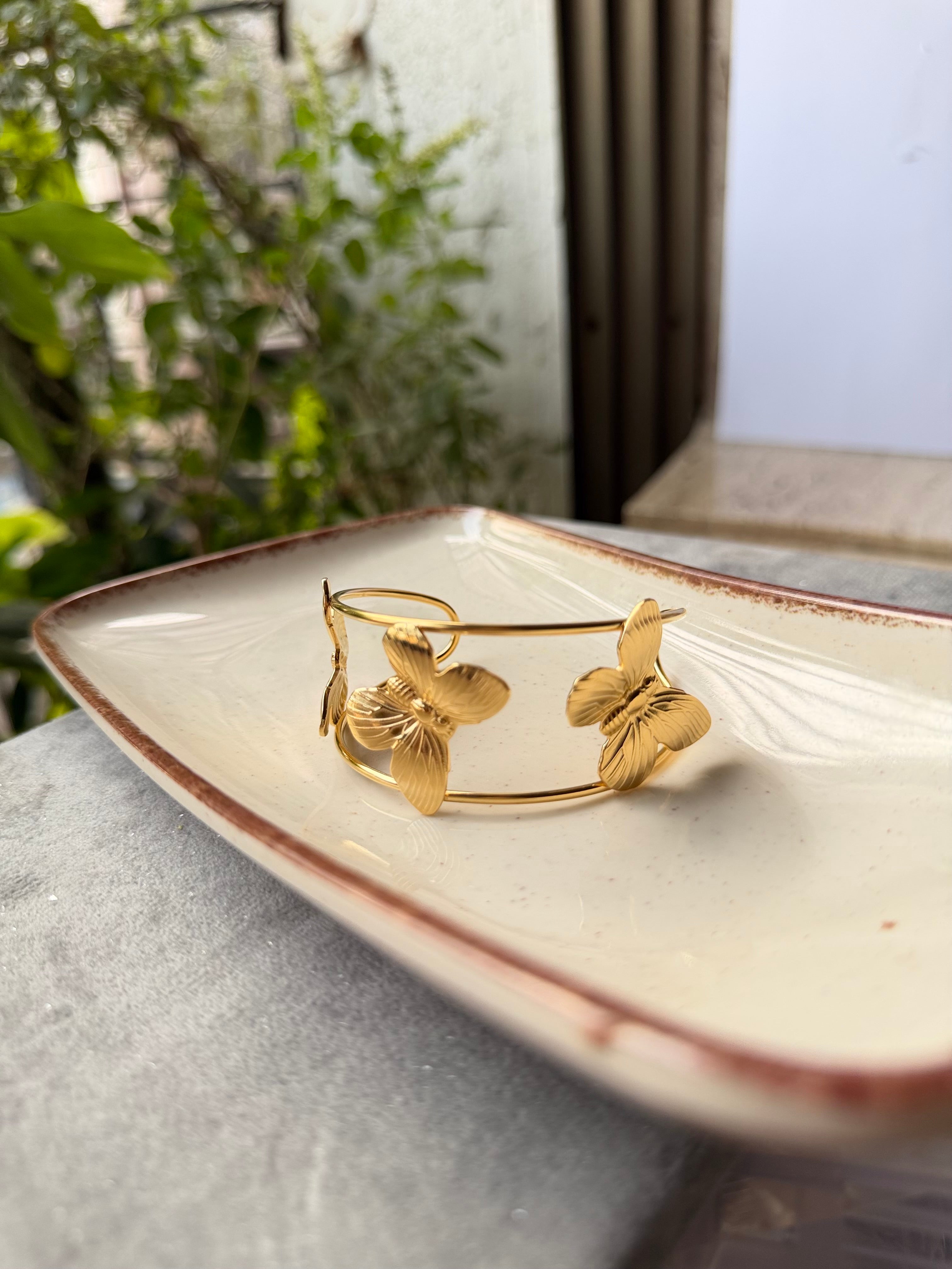 Golden butterfly vine cuff