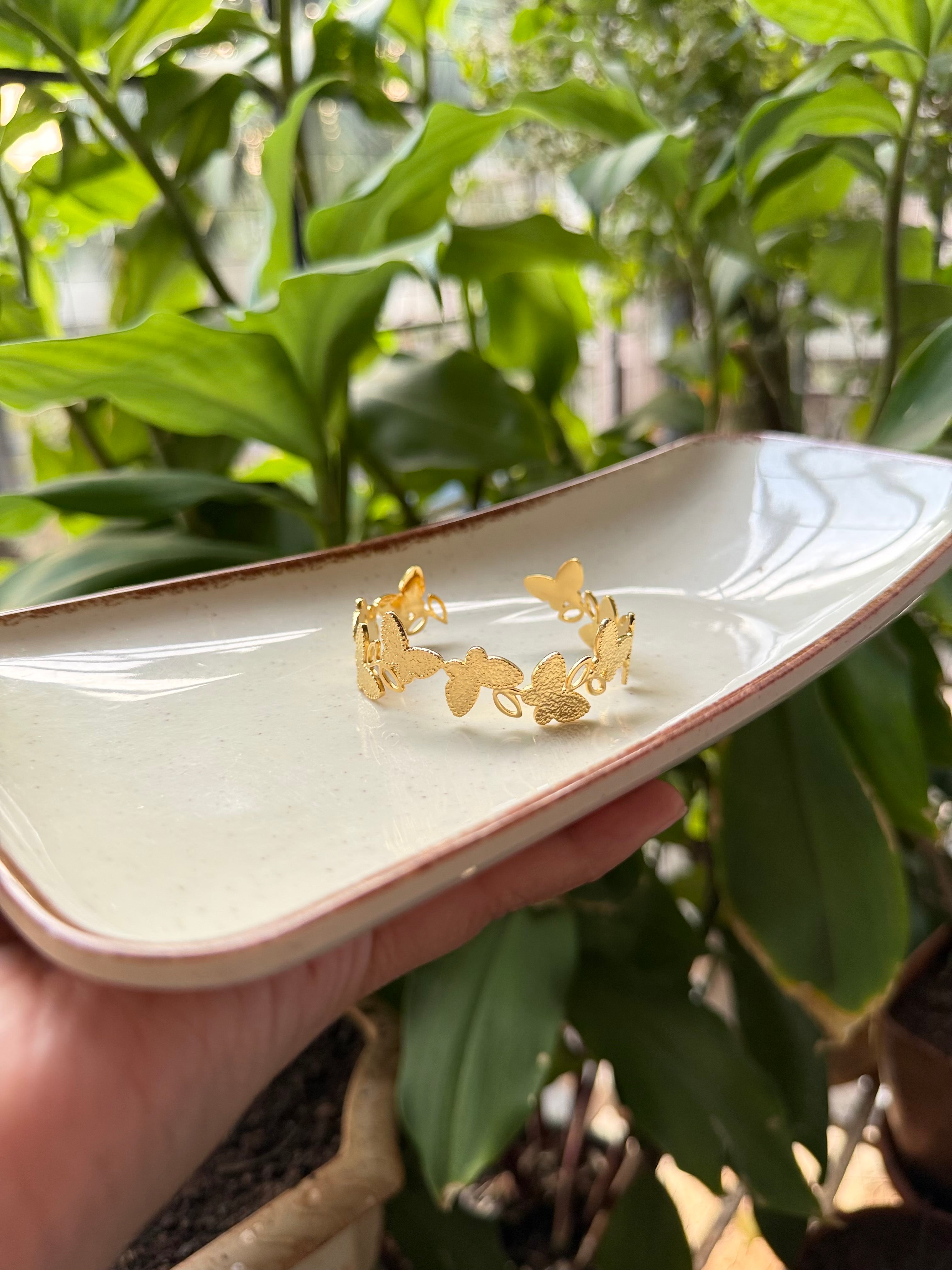Golden flutter wing cuff