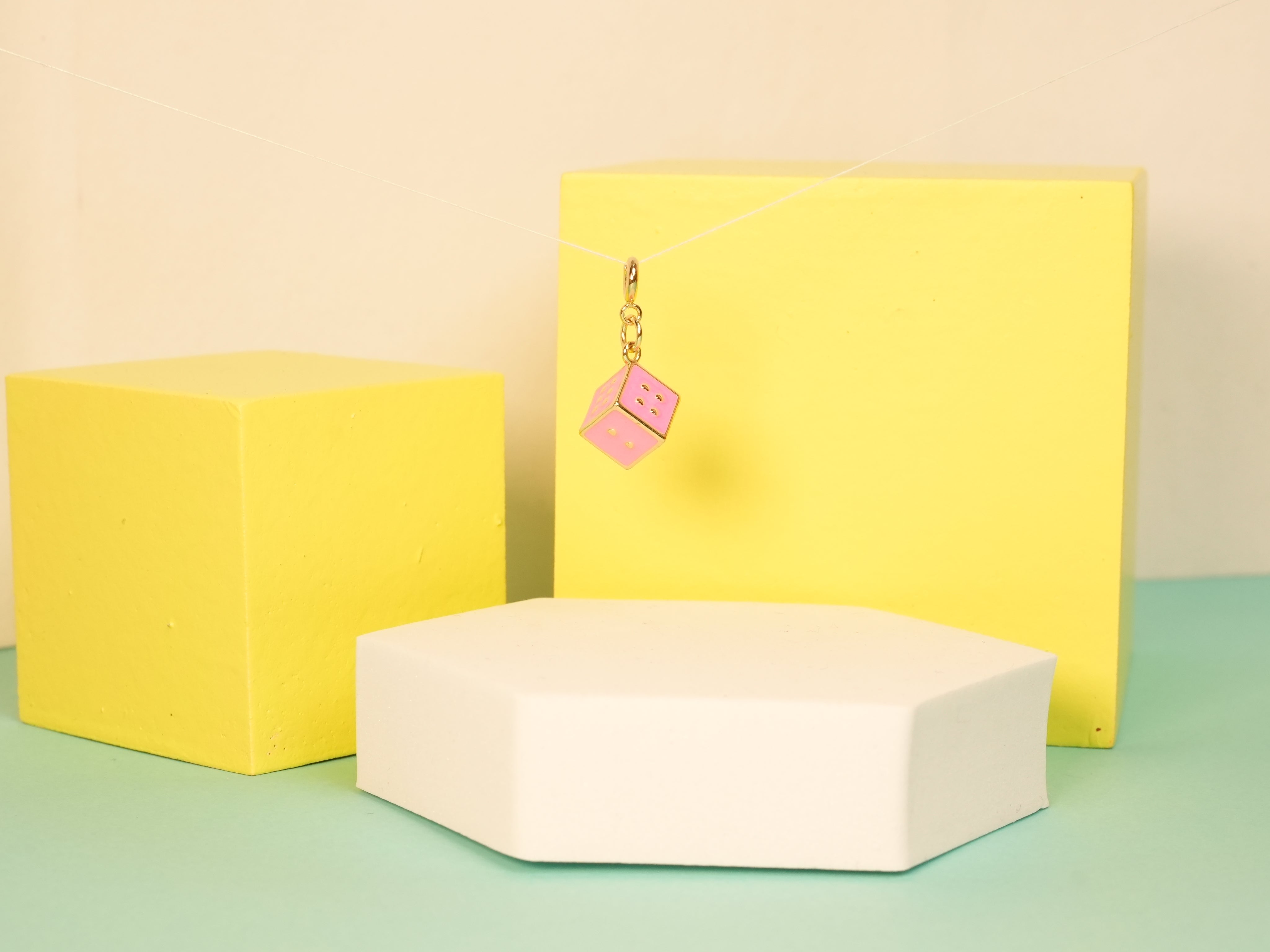 Pink dice charm