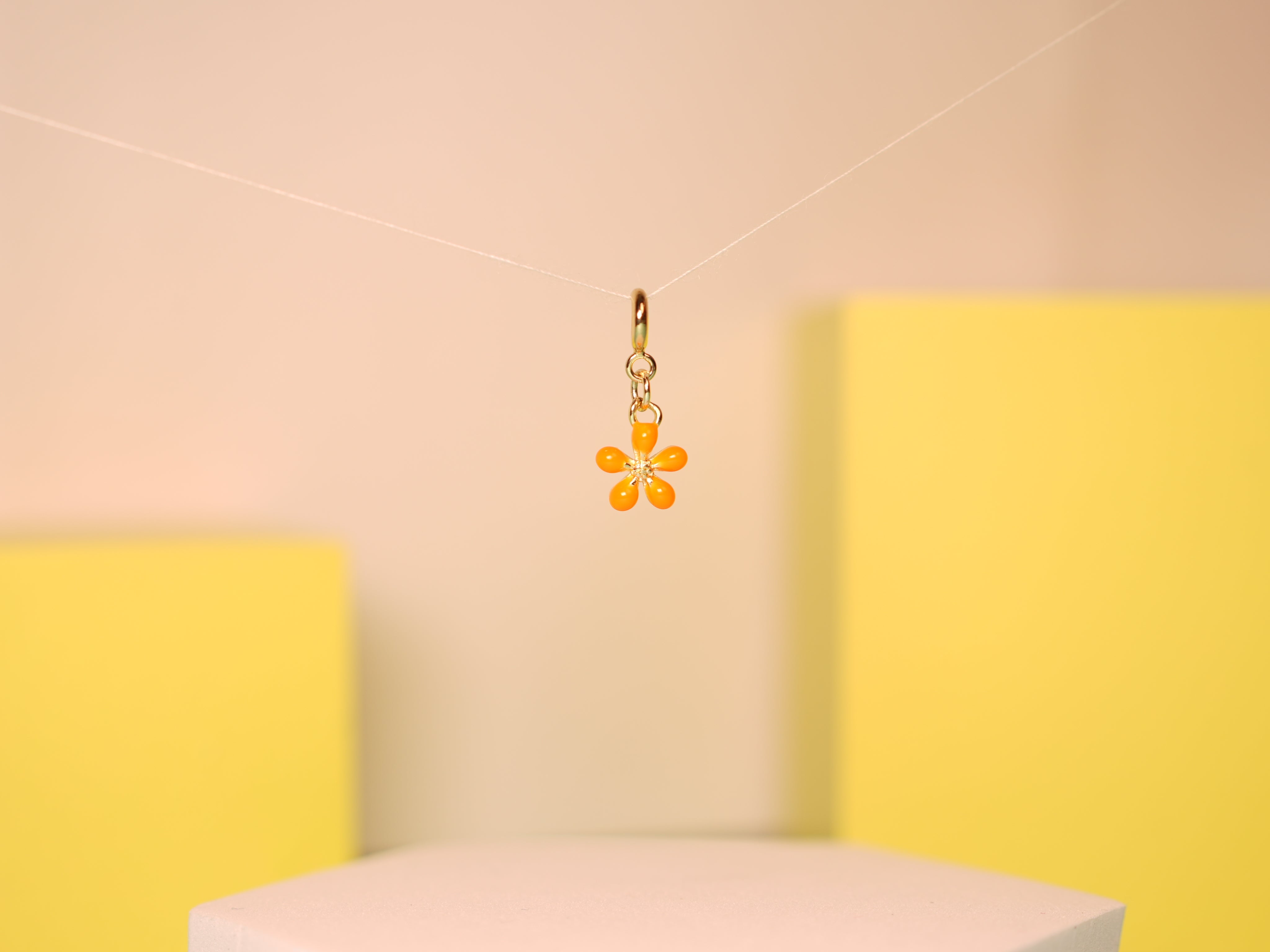 Orange bloom charm