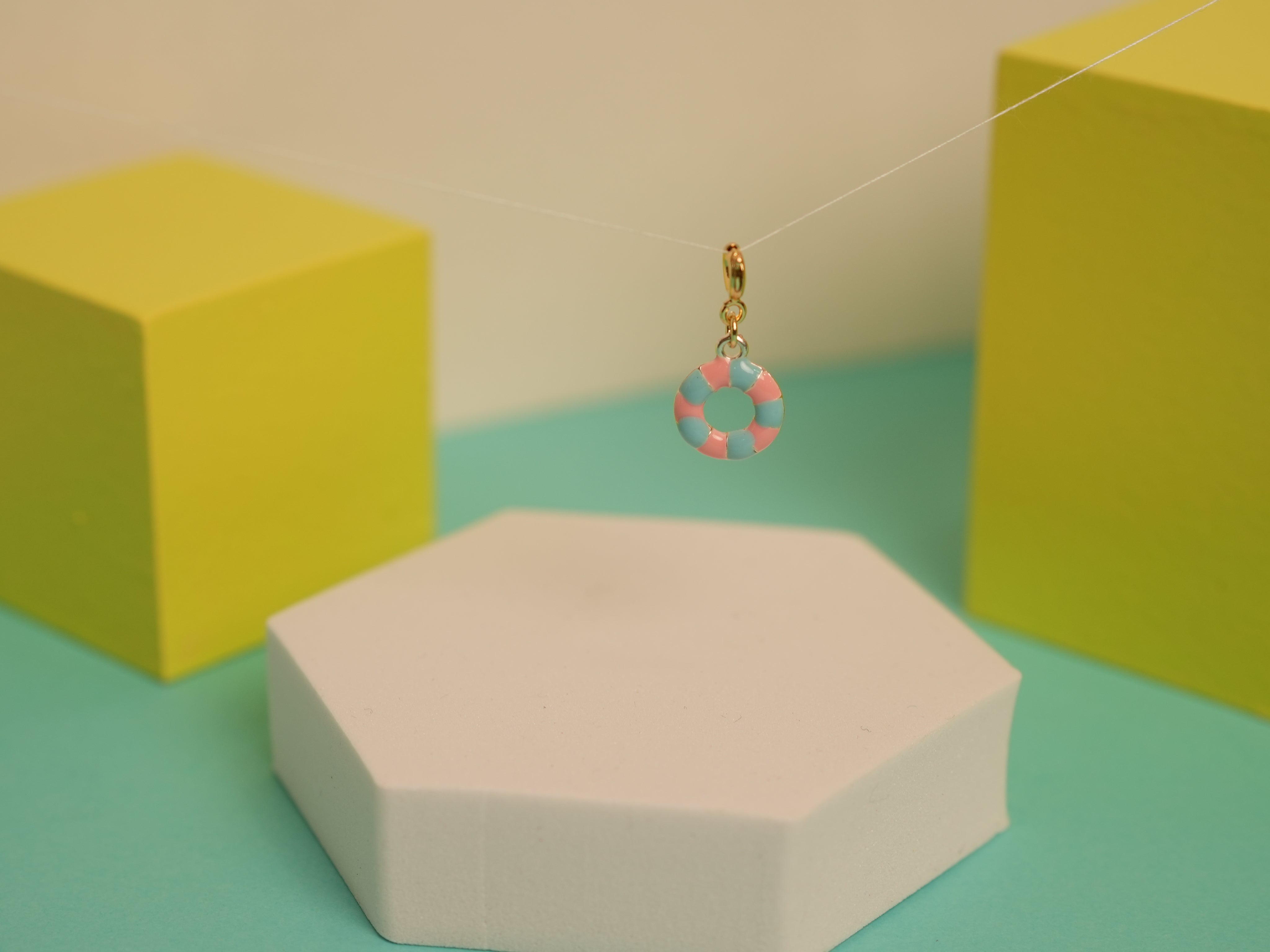 Swim tube charm
