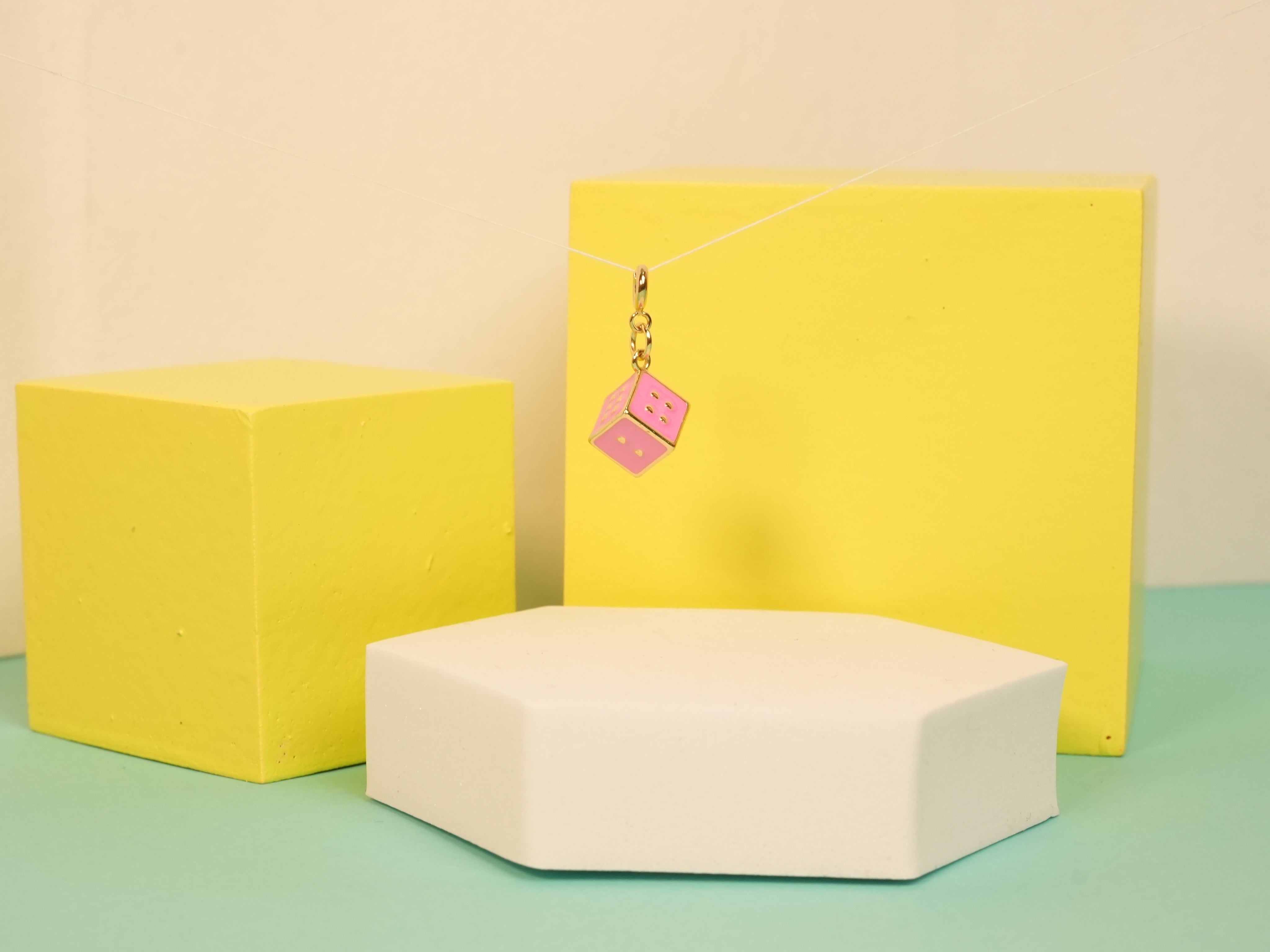 Pink dice charm