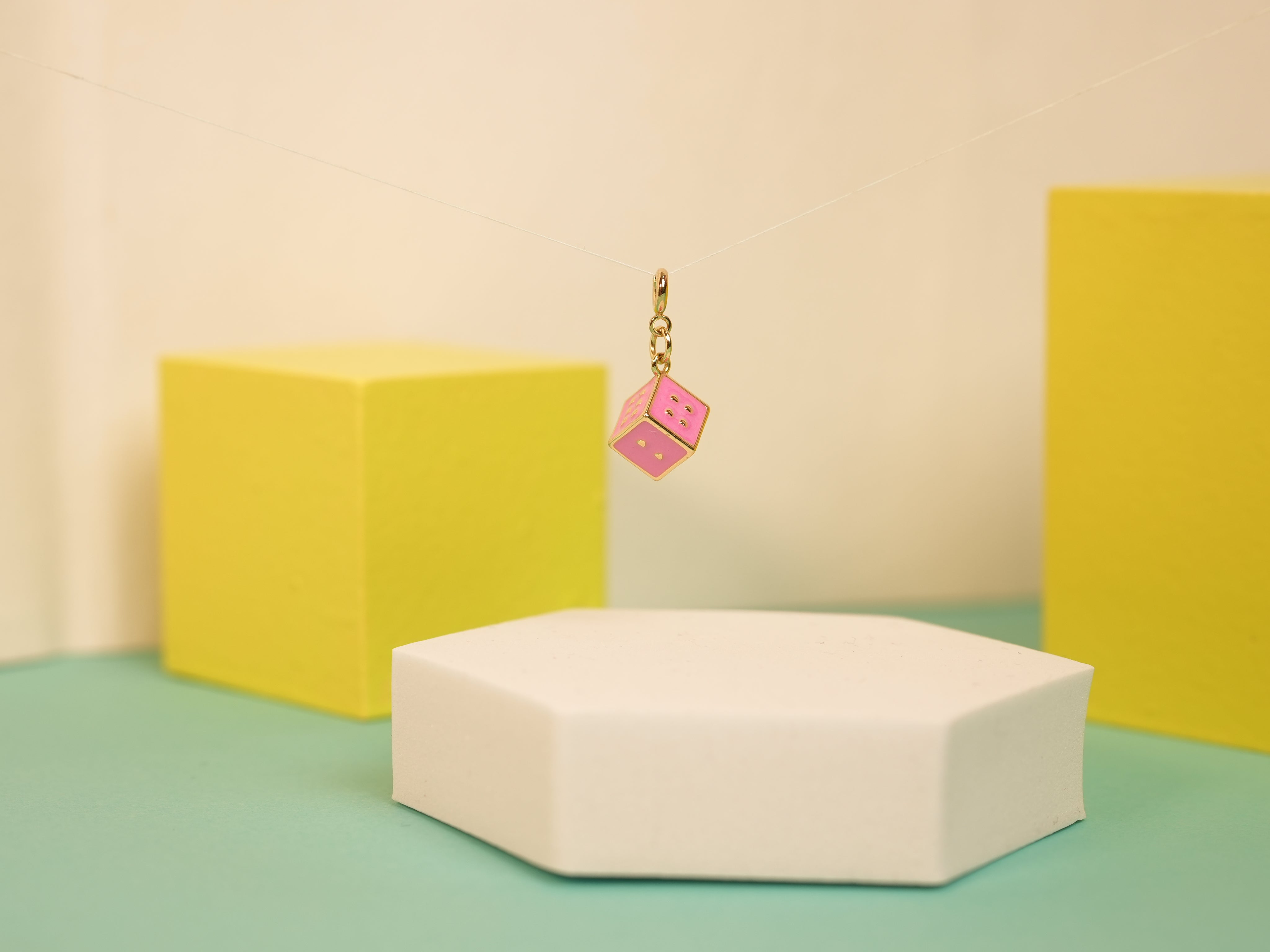 Pink dice charm