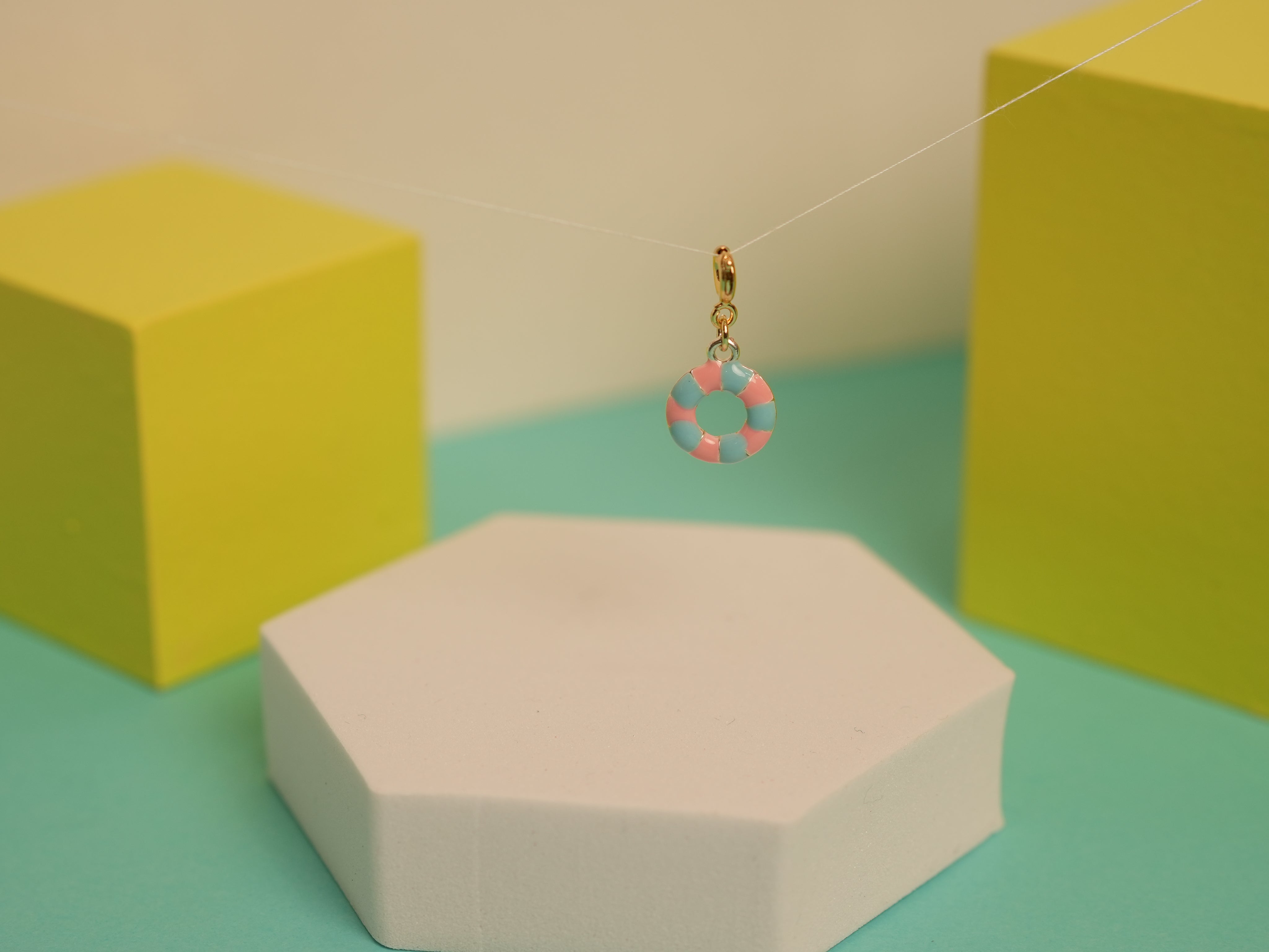Swim tube charm