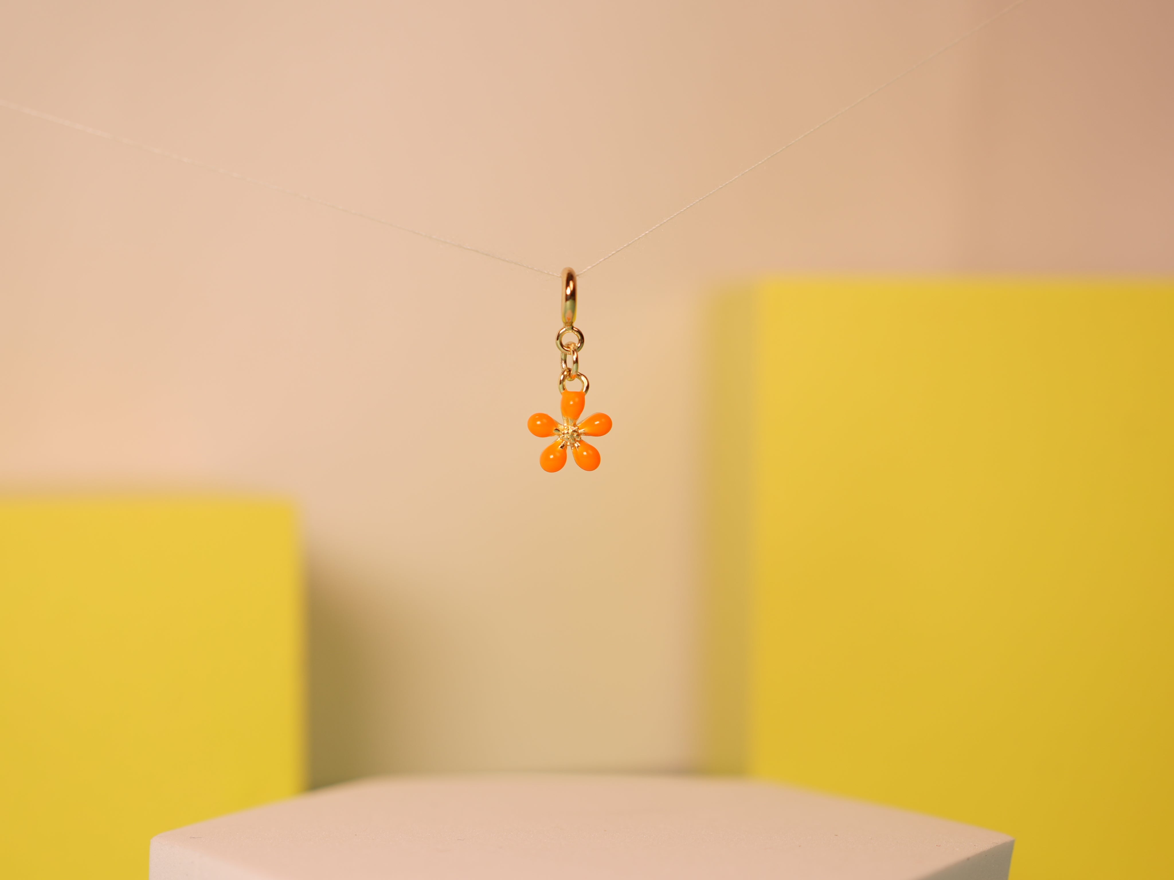Orange bloom charm