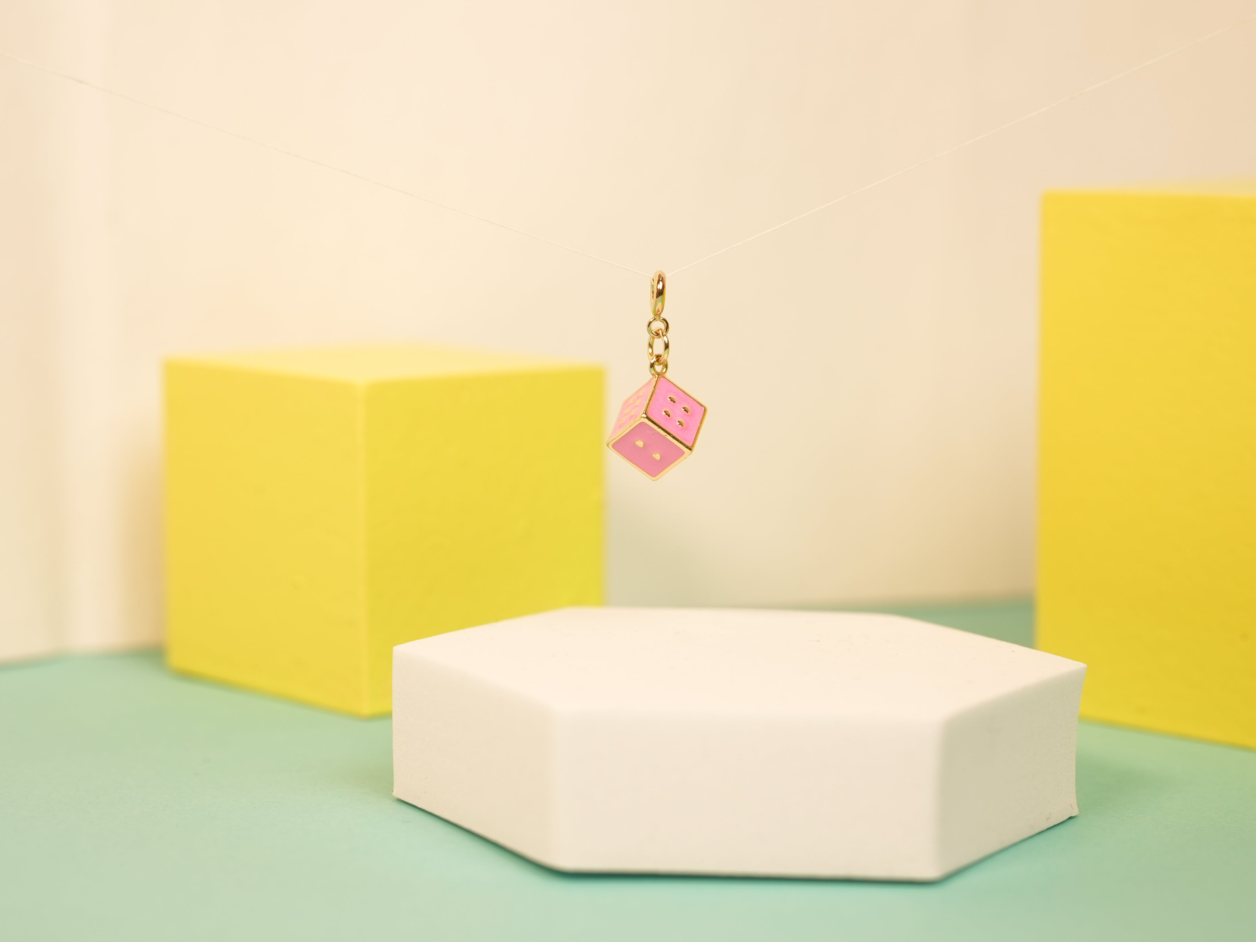 Pink dice charm