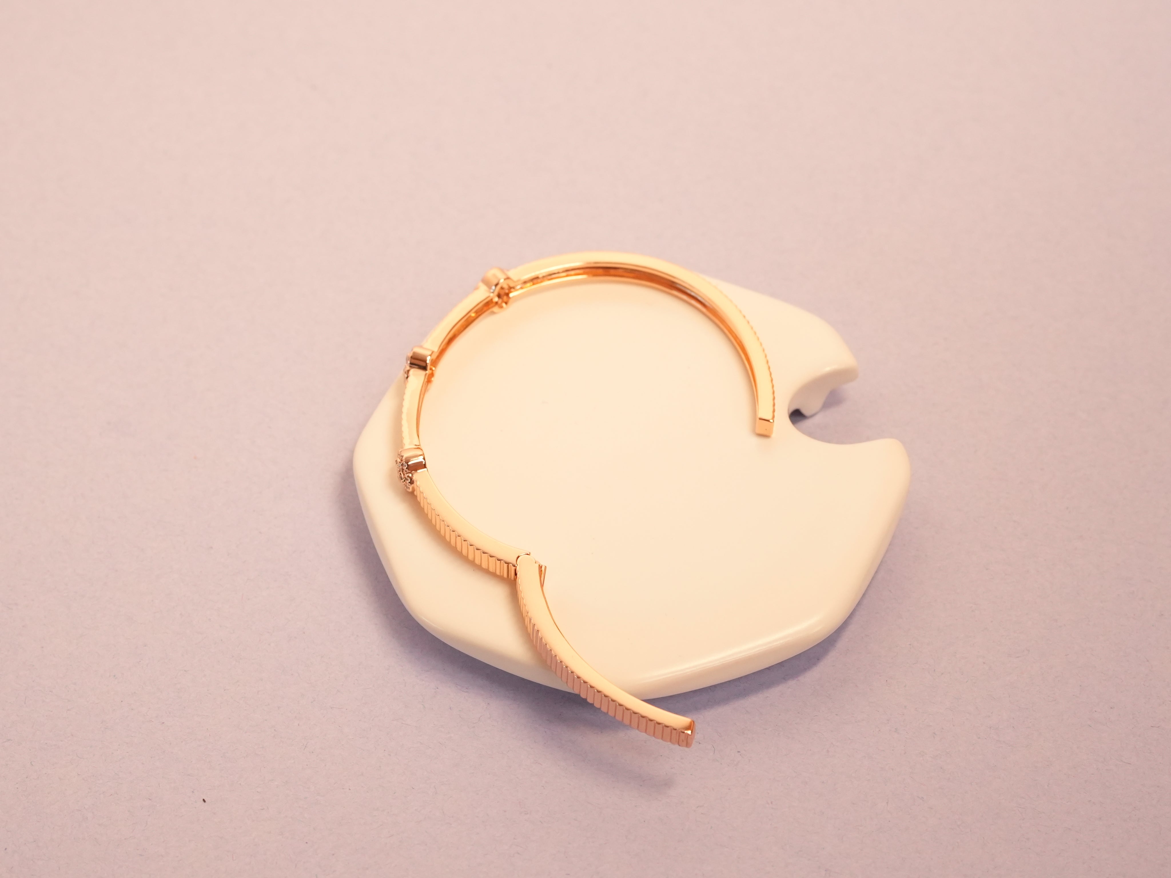 Dazzle eye coil rose gold