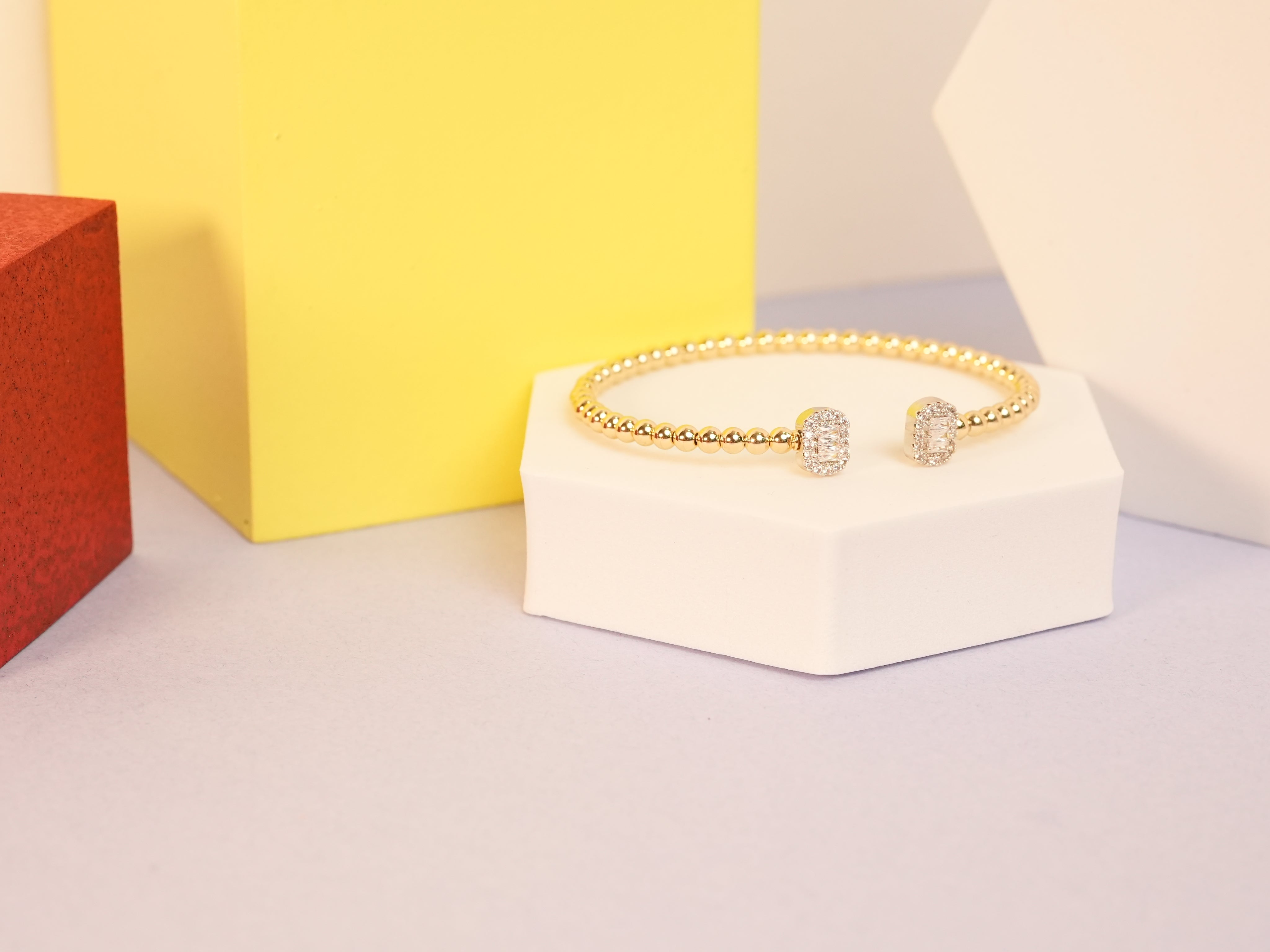 Beaded emerald  cut  gold