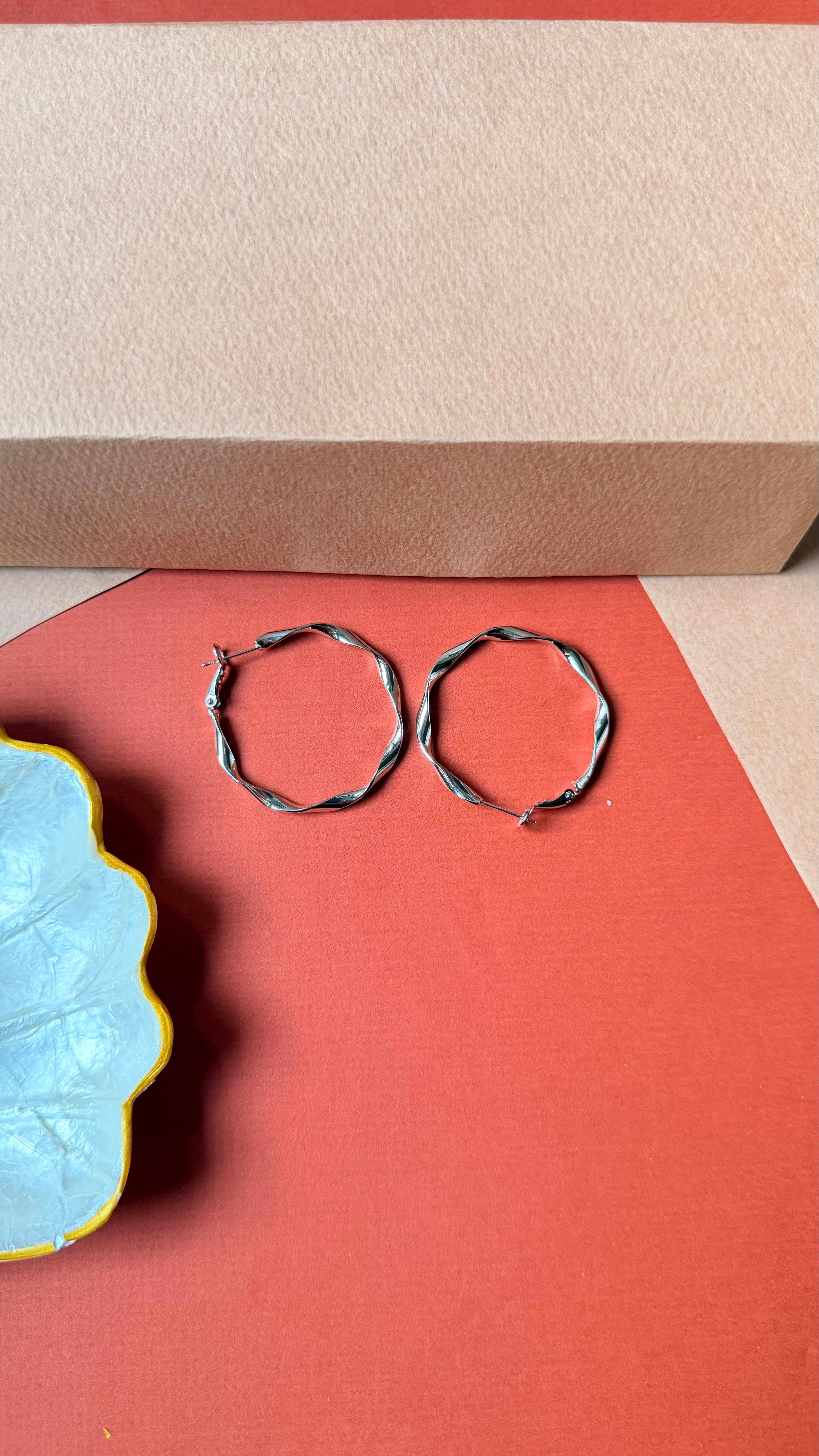 Wavy silver hoop