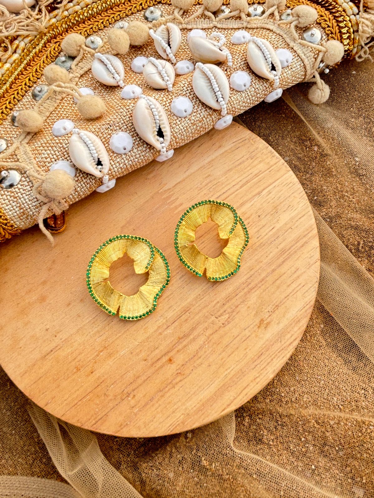 The shaving swirl stud green