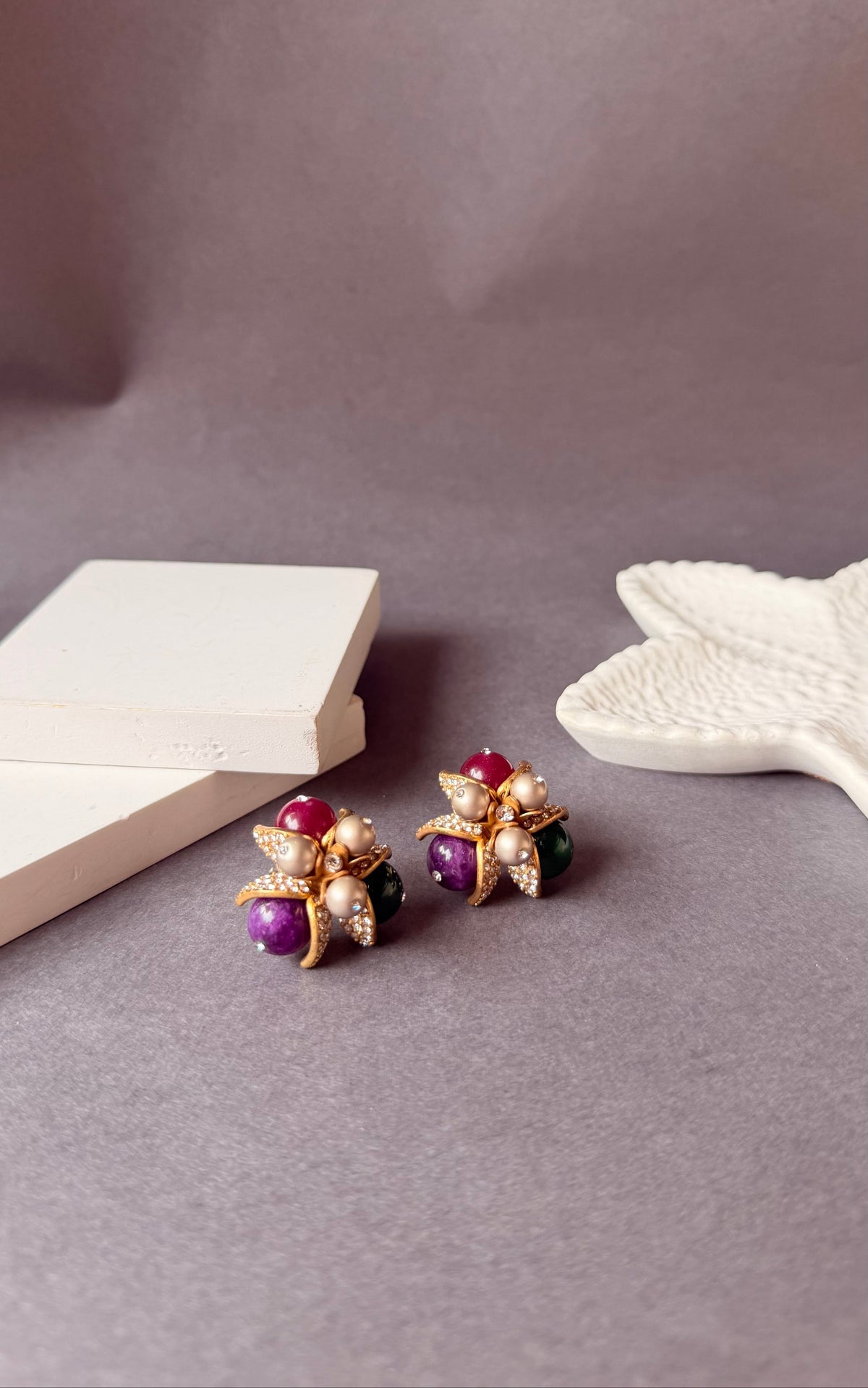 Daga-accessories Berry Bloom statement earrings featuring berry-toned beads, pearls, and crystals in stainless steel.