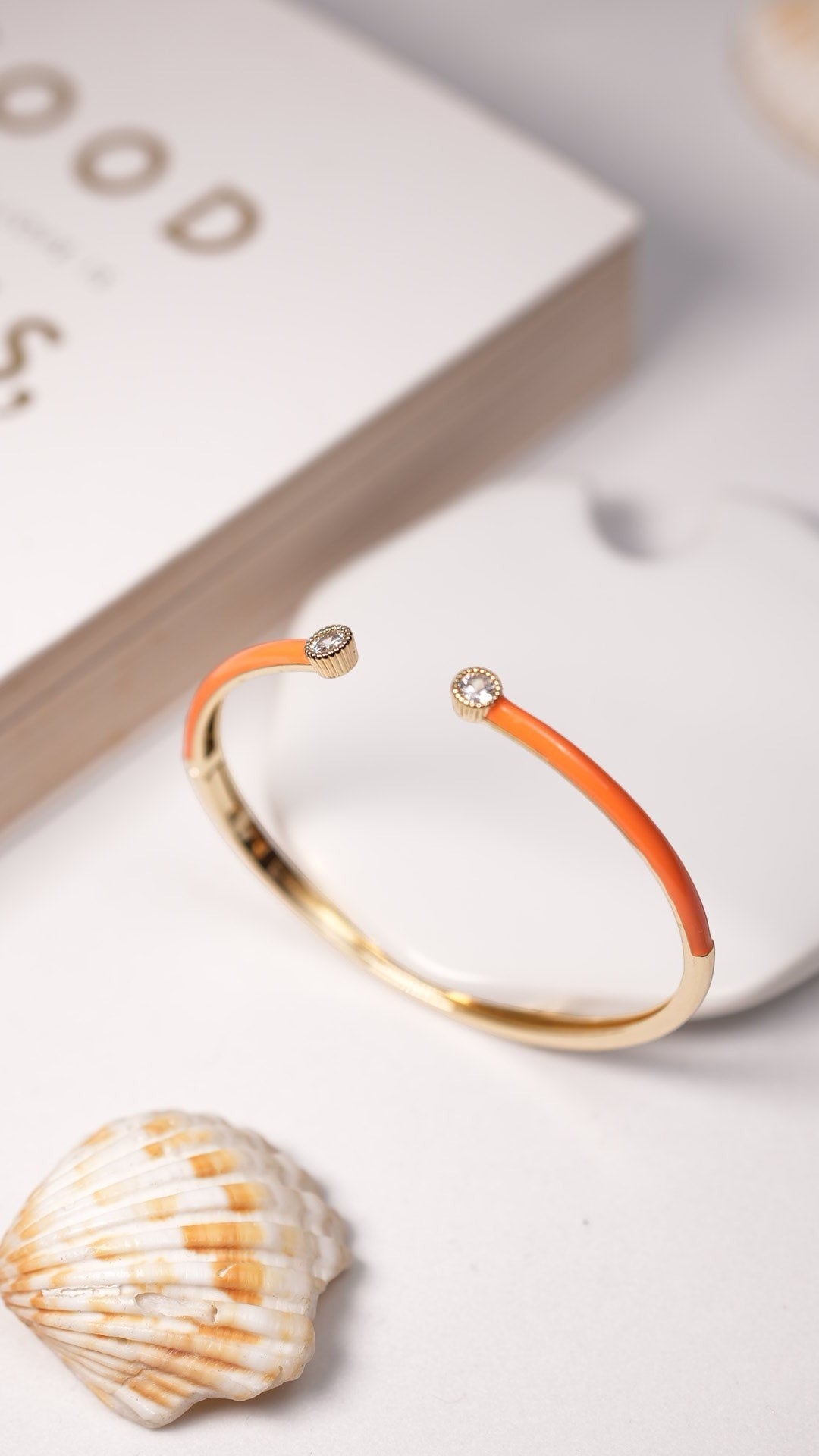 Daga-accessories coral enamel cuff bracelet with gold-tone metallic tips and sparkling crystal accents
