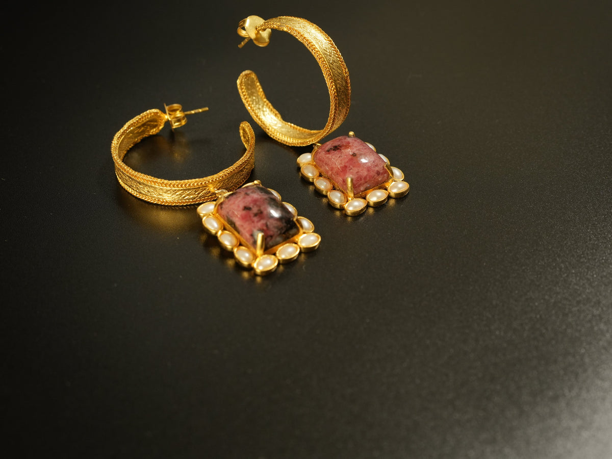 Daga-accessories Crystal Bloom gold hoop earrings featuring rectangular pink stones and small pearl accents