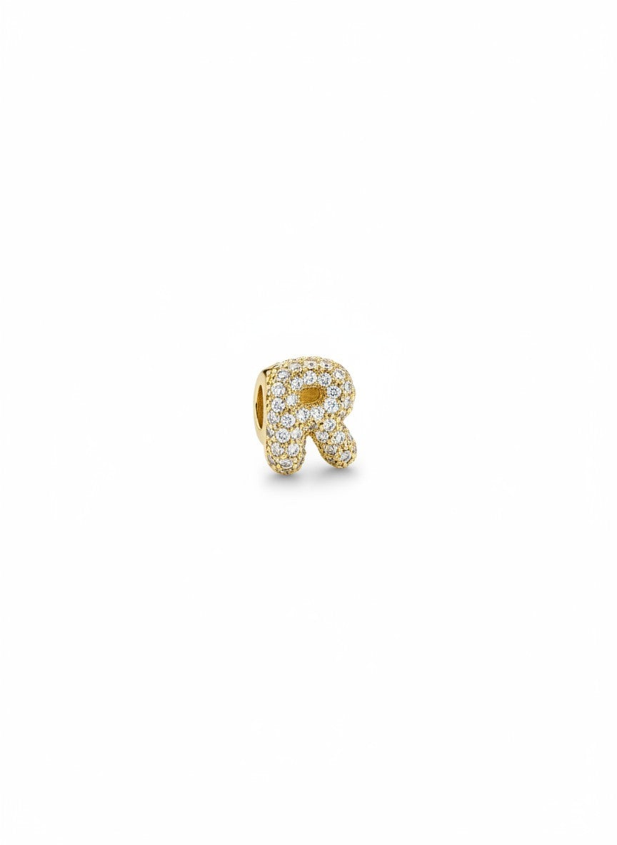 Daga-accessories gold-tone letter R charm featuring pavé-set crystals for a sparkling, elegant jewelry accessory.