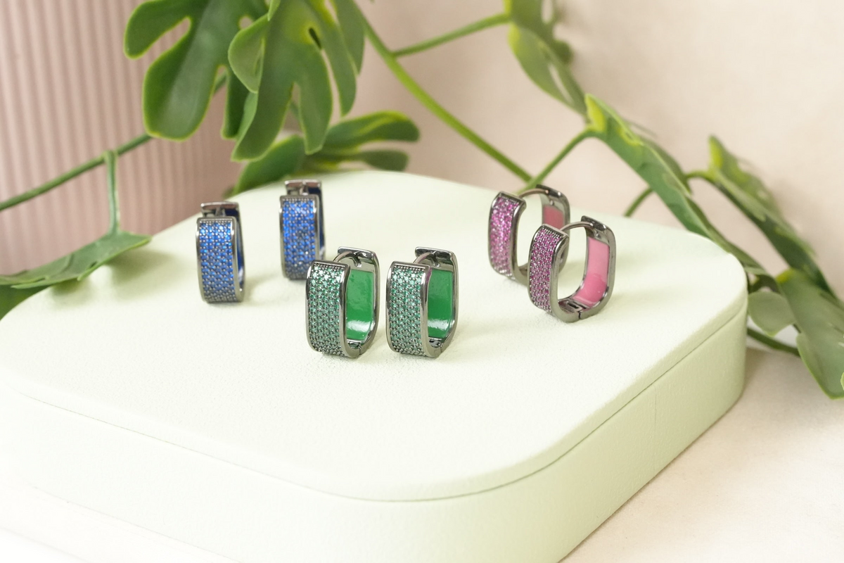 Daga-accessories rectangular hoop earrings with gunmetal finish and micro-pave stones in blue, green, and pink.